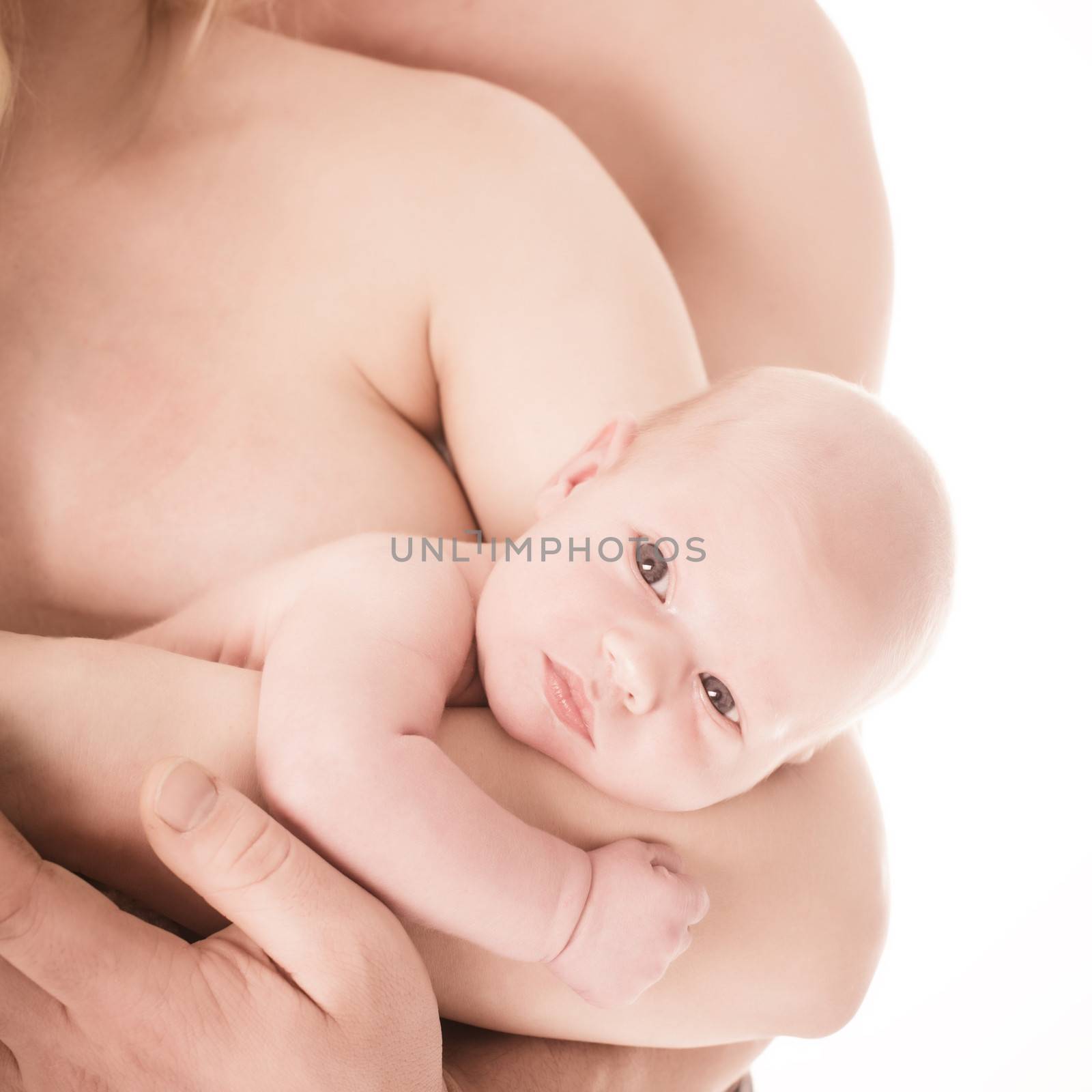 Mother and father with newborn baby close up