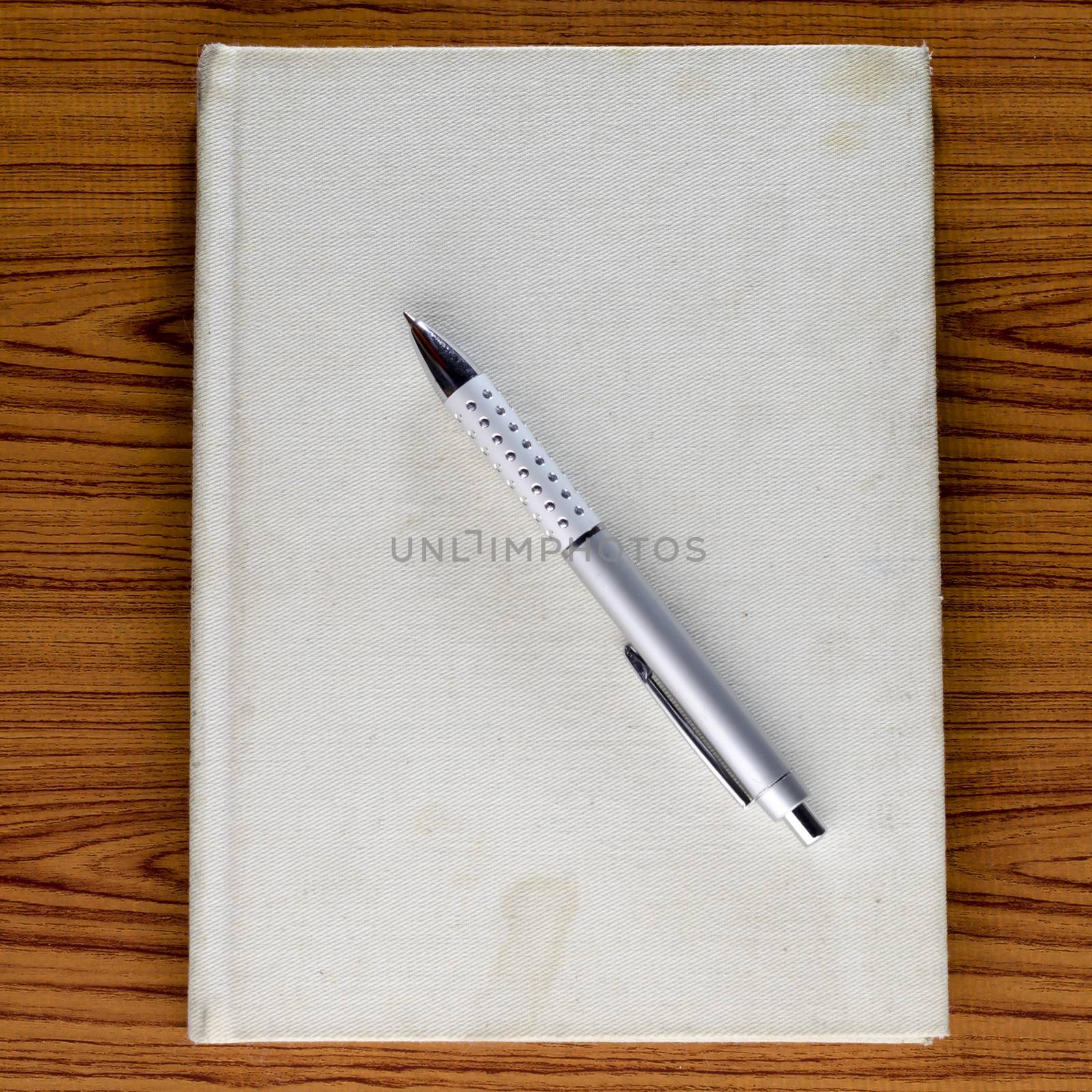 notebook on wood background