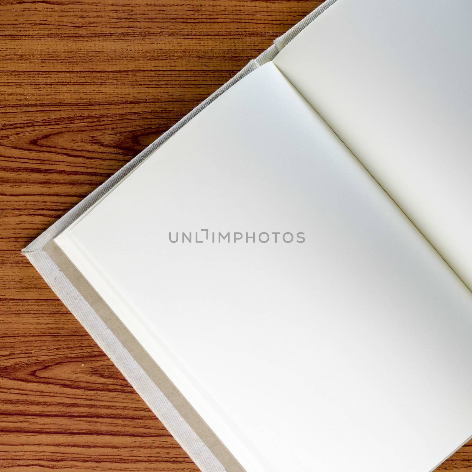 notebook on wood background