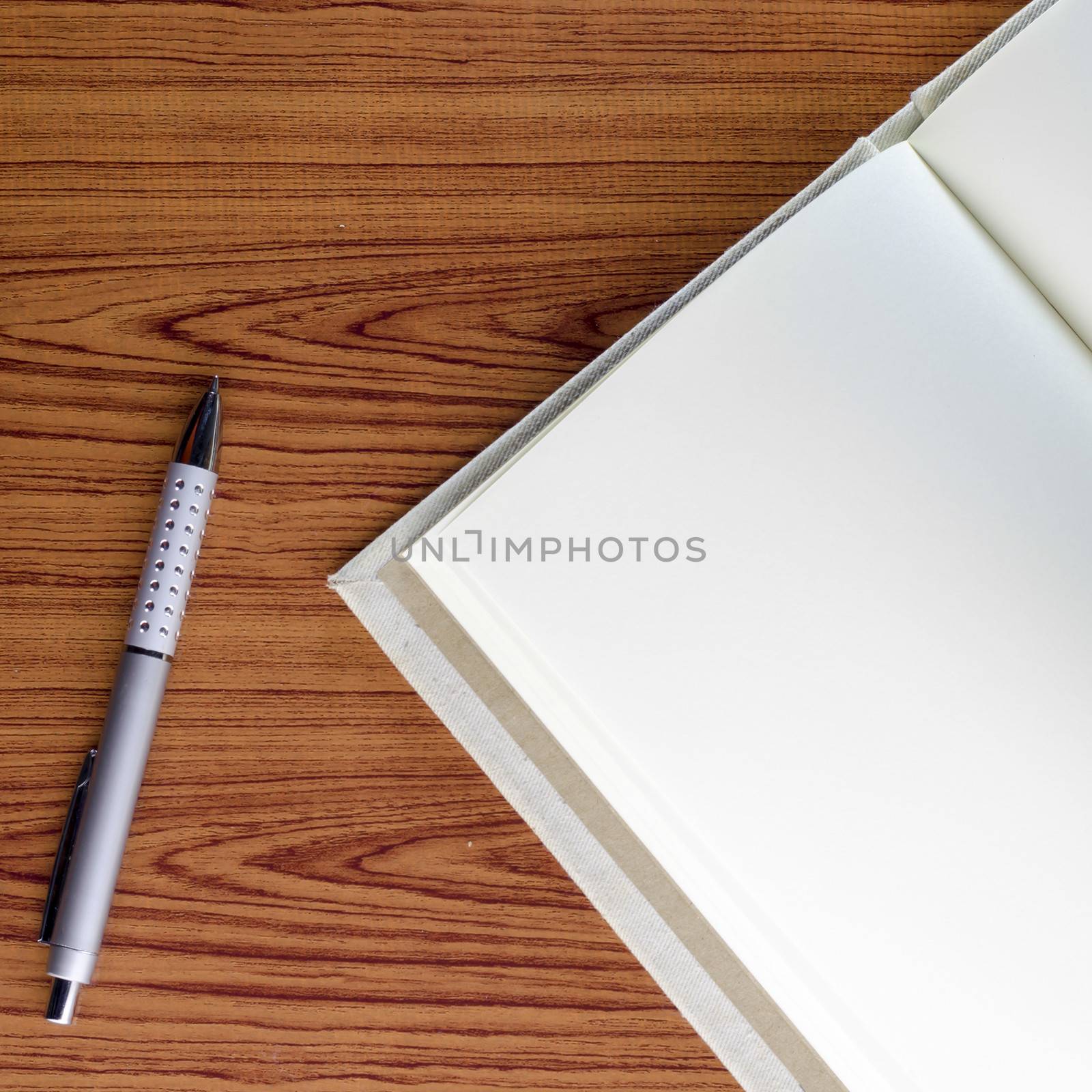 notebook on wood background