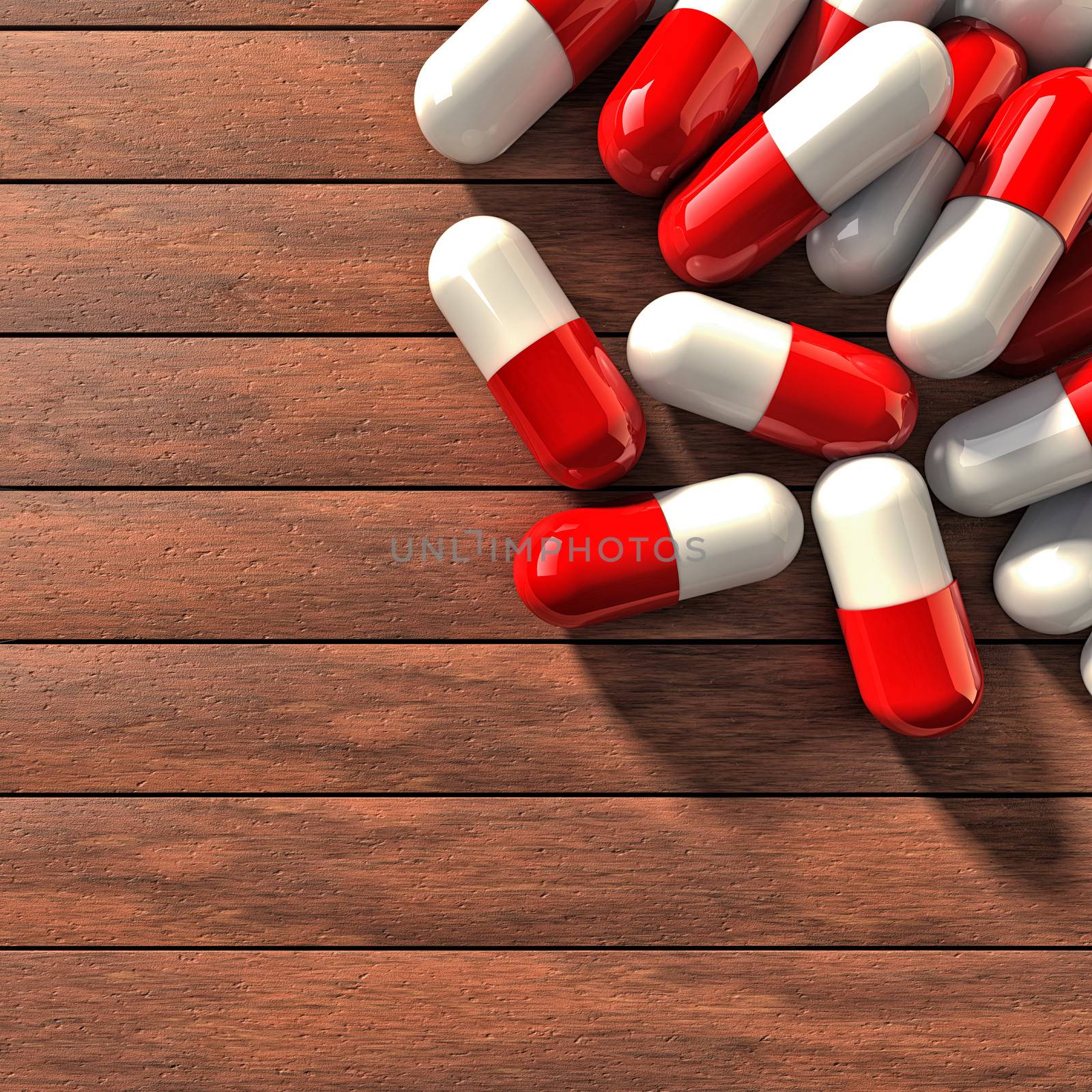 Several pills on a wood table
