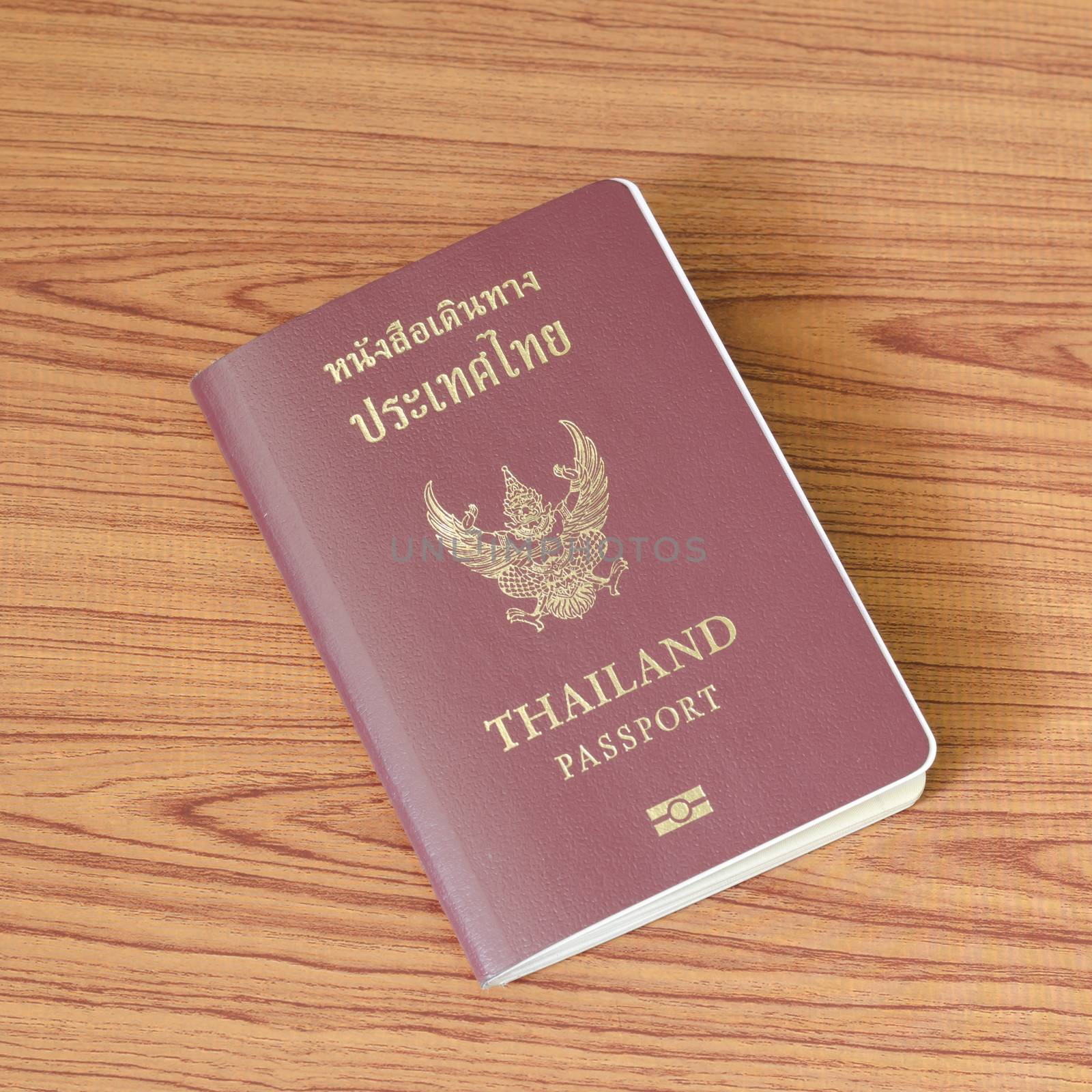 Thai passport on wood table background