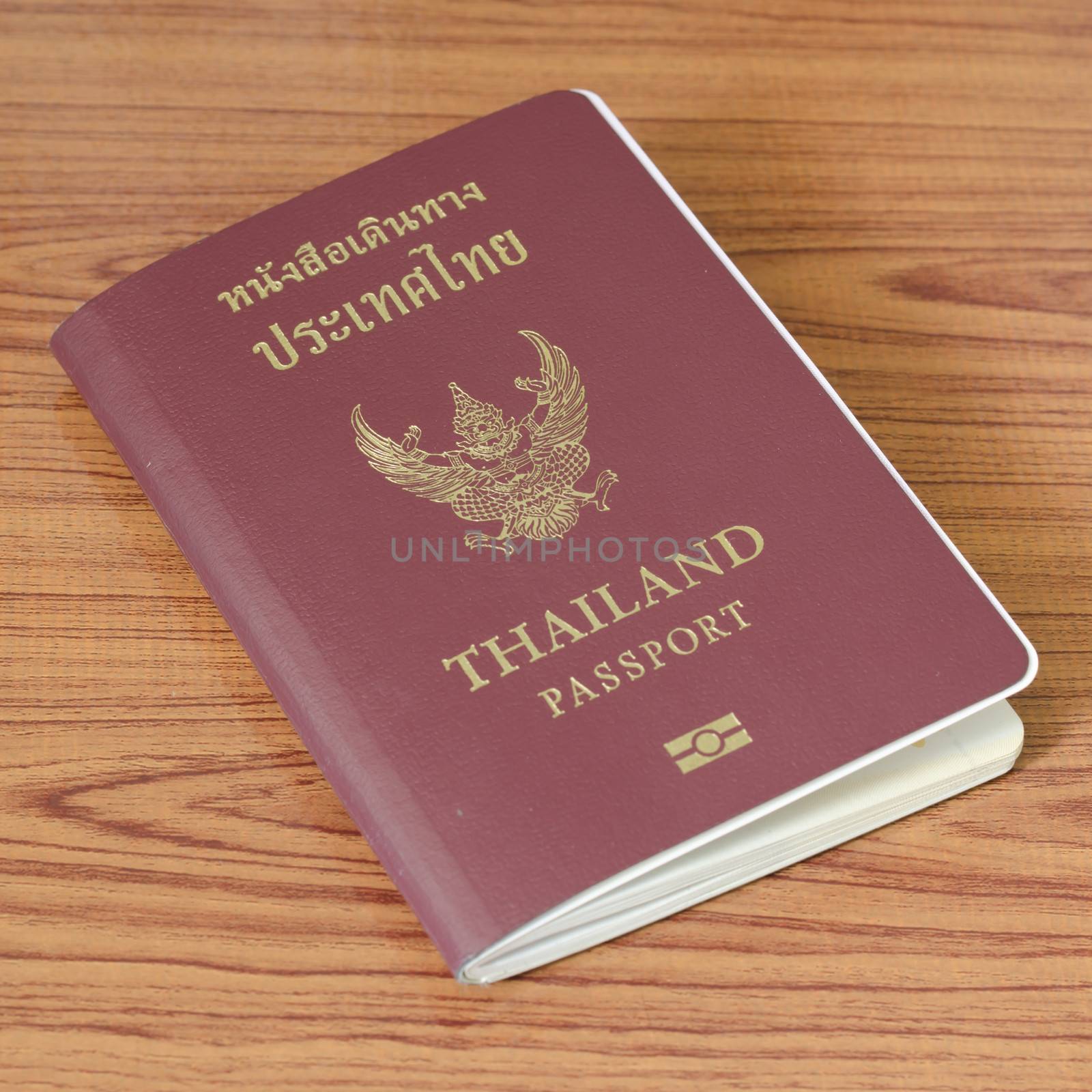 Thai passport on wood table background