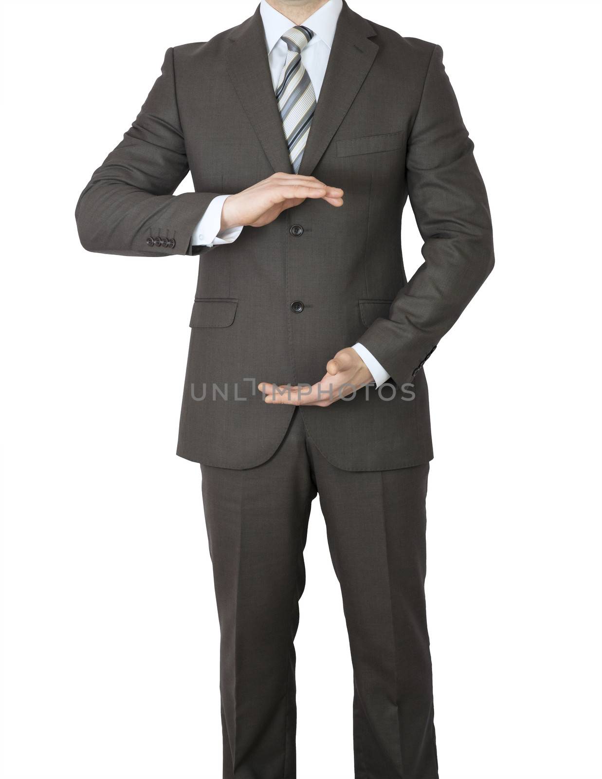 Man in suit holding his hands before him. Crop