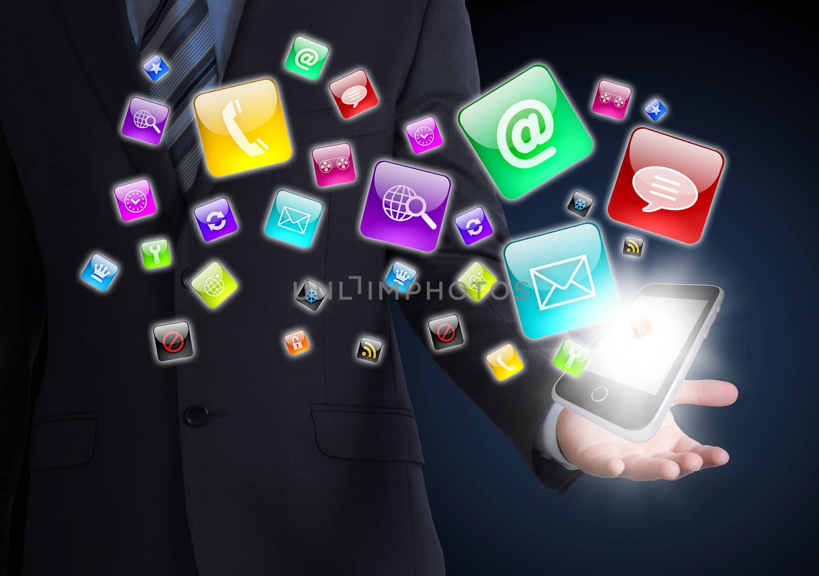 Man in suit holding a smartphone in hand. Application icons around smartphone. The concept of software