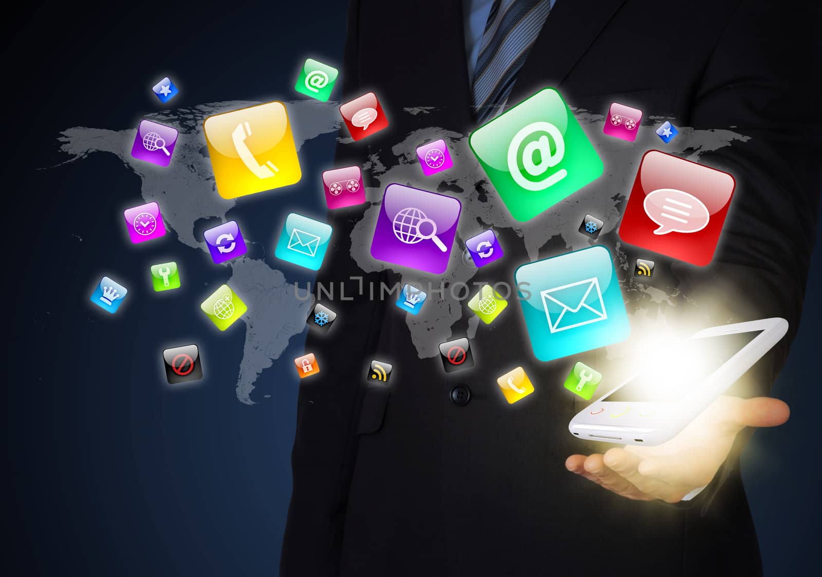 Man in suit holding a smartphone in hand. Application icons around smartphone. The concept of software