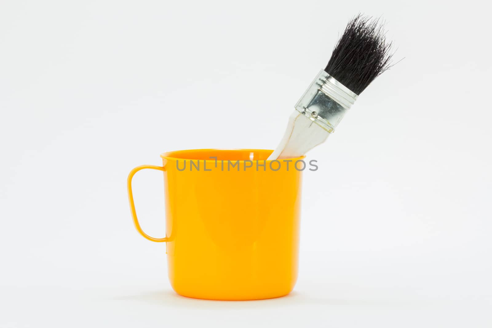 plastic cup with brush