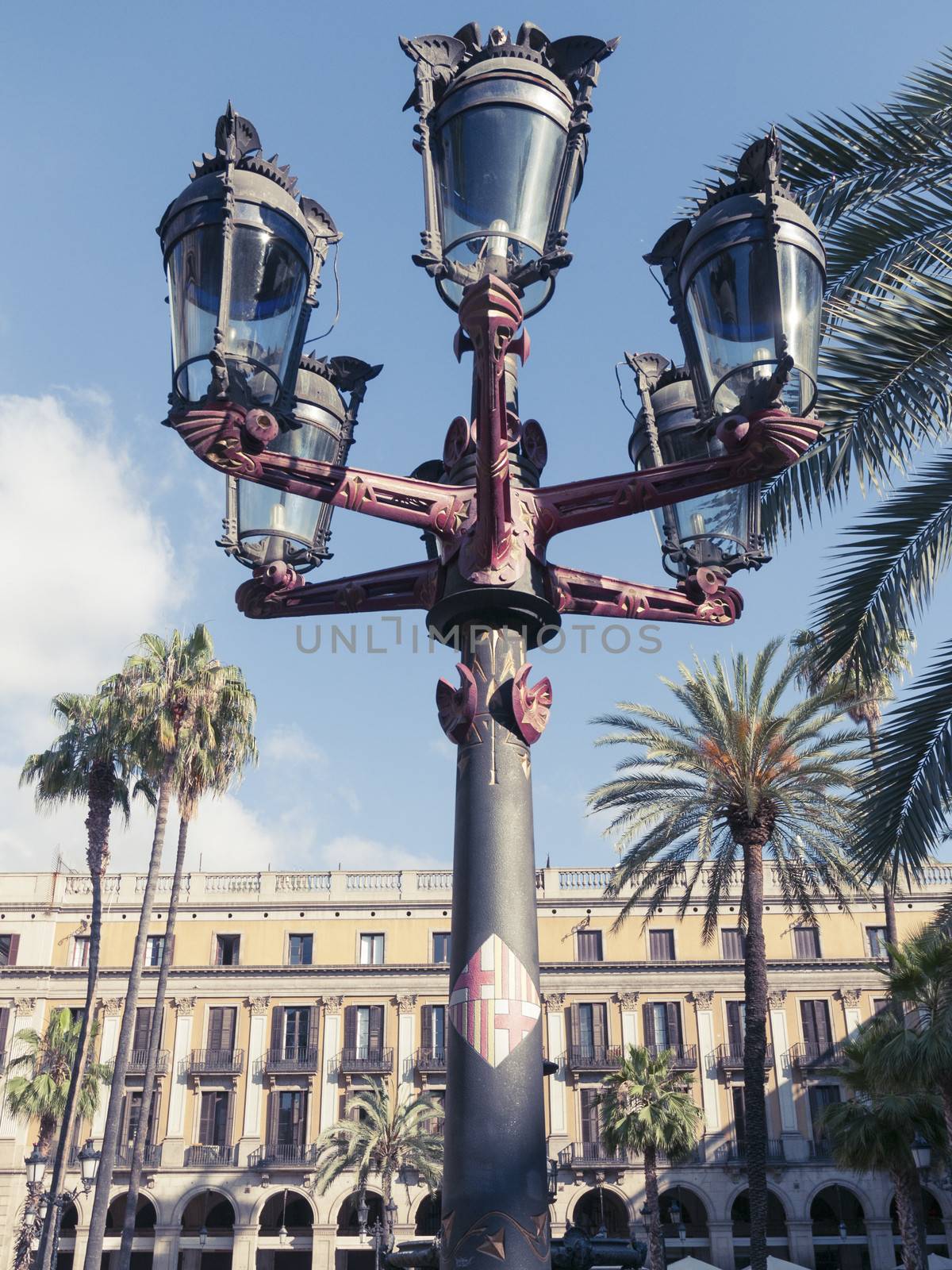 famous street lamp created by modernist architect Antonio Gaudi in 19th century on Placa Reial in Barcelona