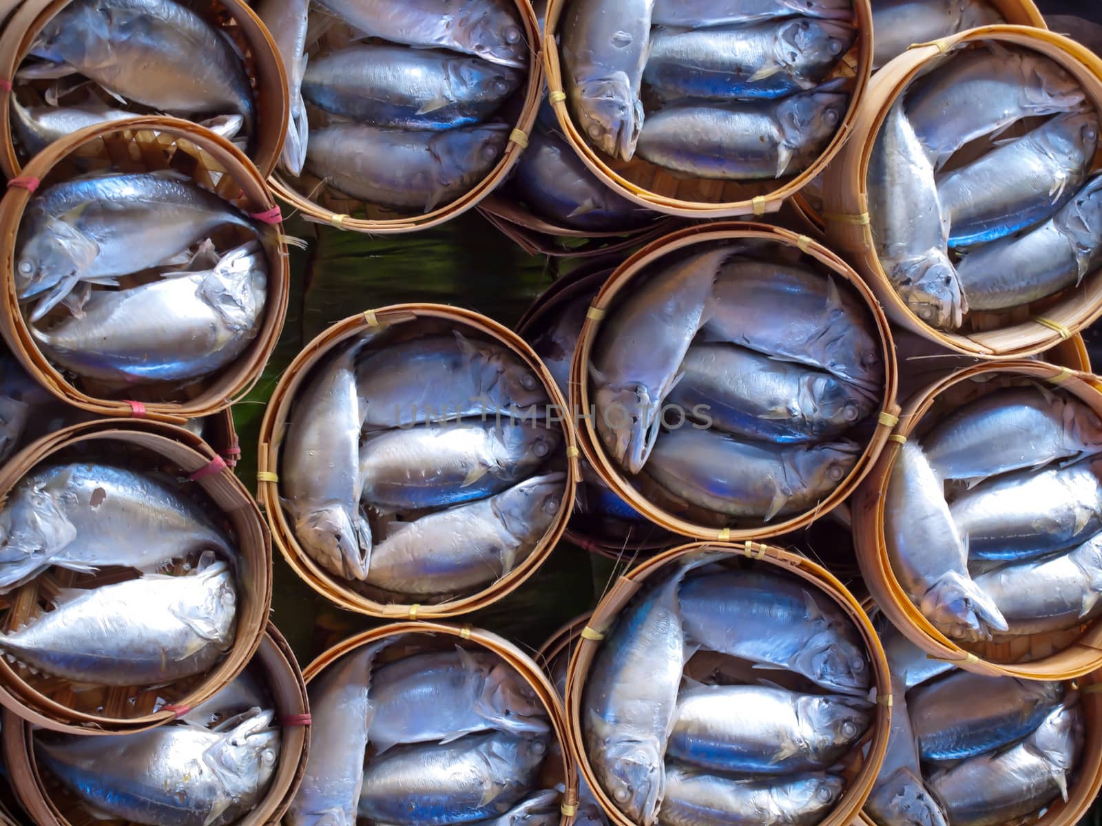 Steam mackerels in bamboo basket for sell