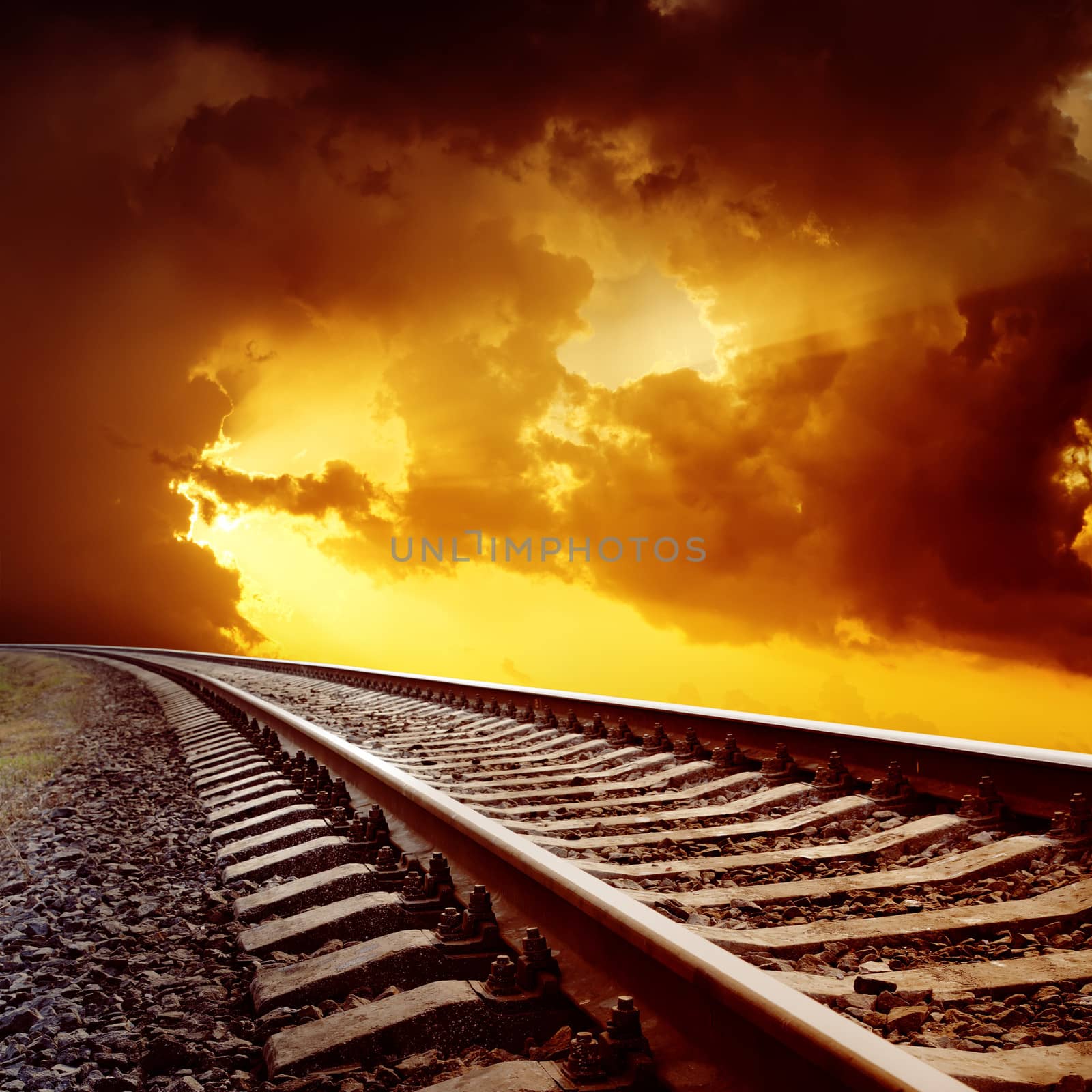 railroad closeup to orange horizon in sunset