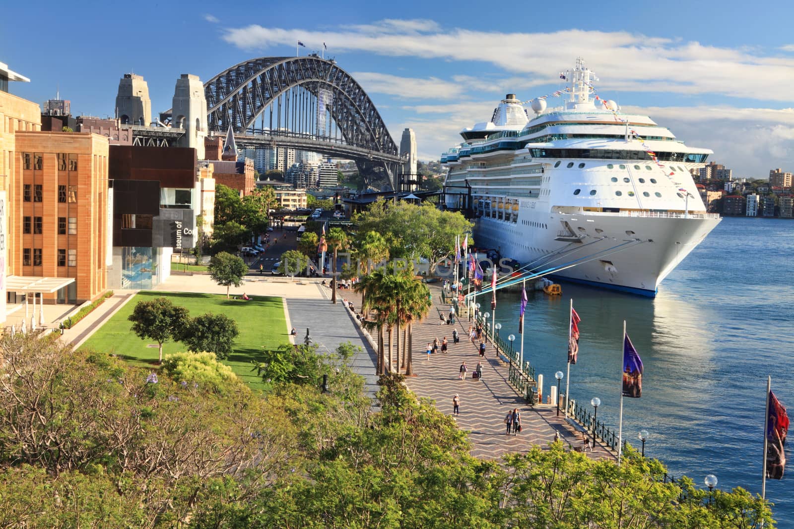 Sydney, Australia - December 1, 2013;  Luxury Cruise liner, Radiance of the Seas, docked at Circular Quay and passengers disembark.