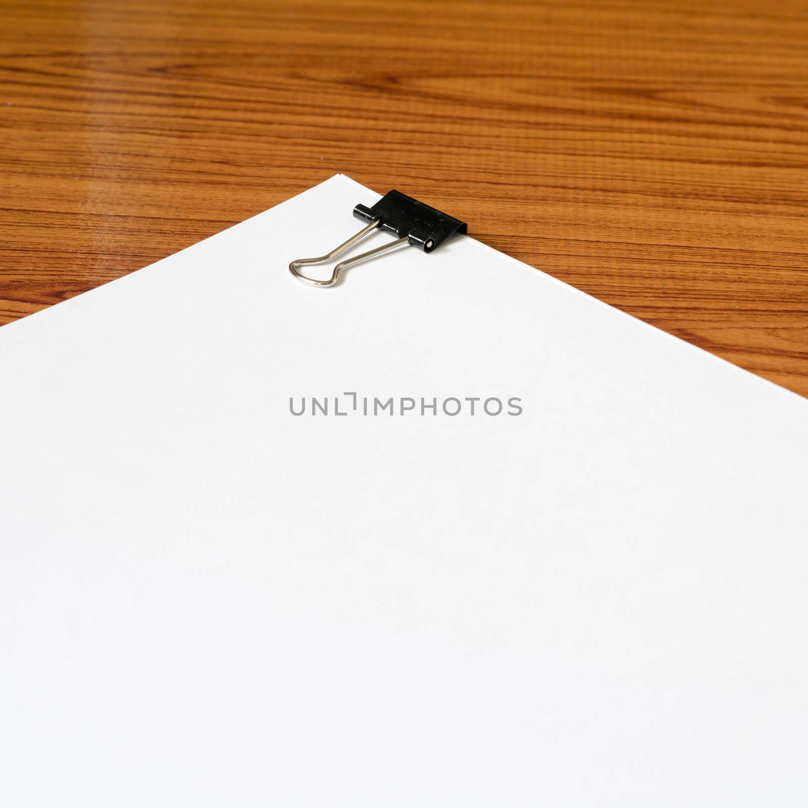 white paper on wood background