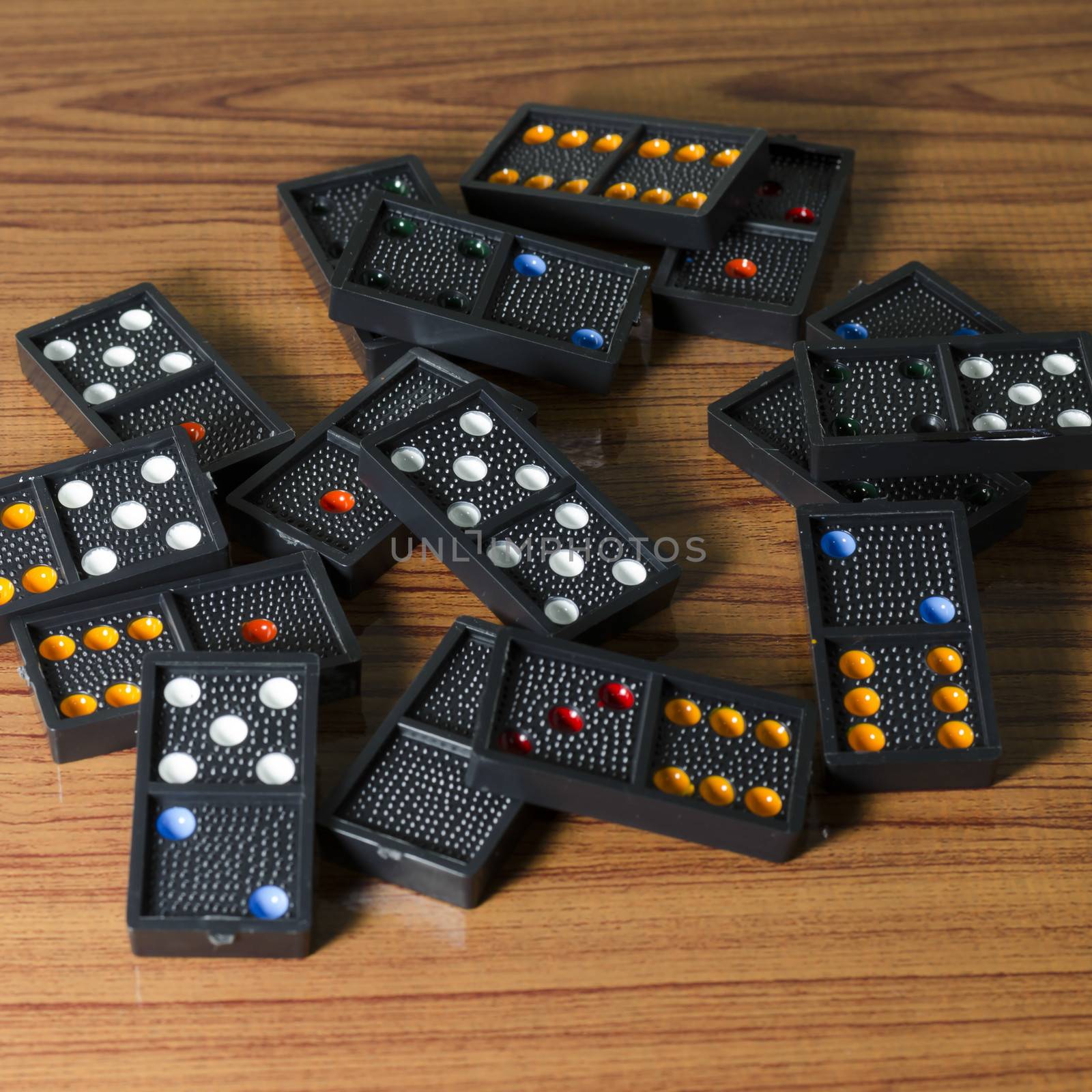 black domino on wooden background