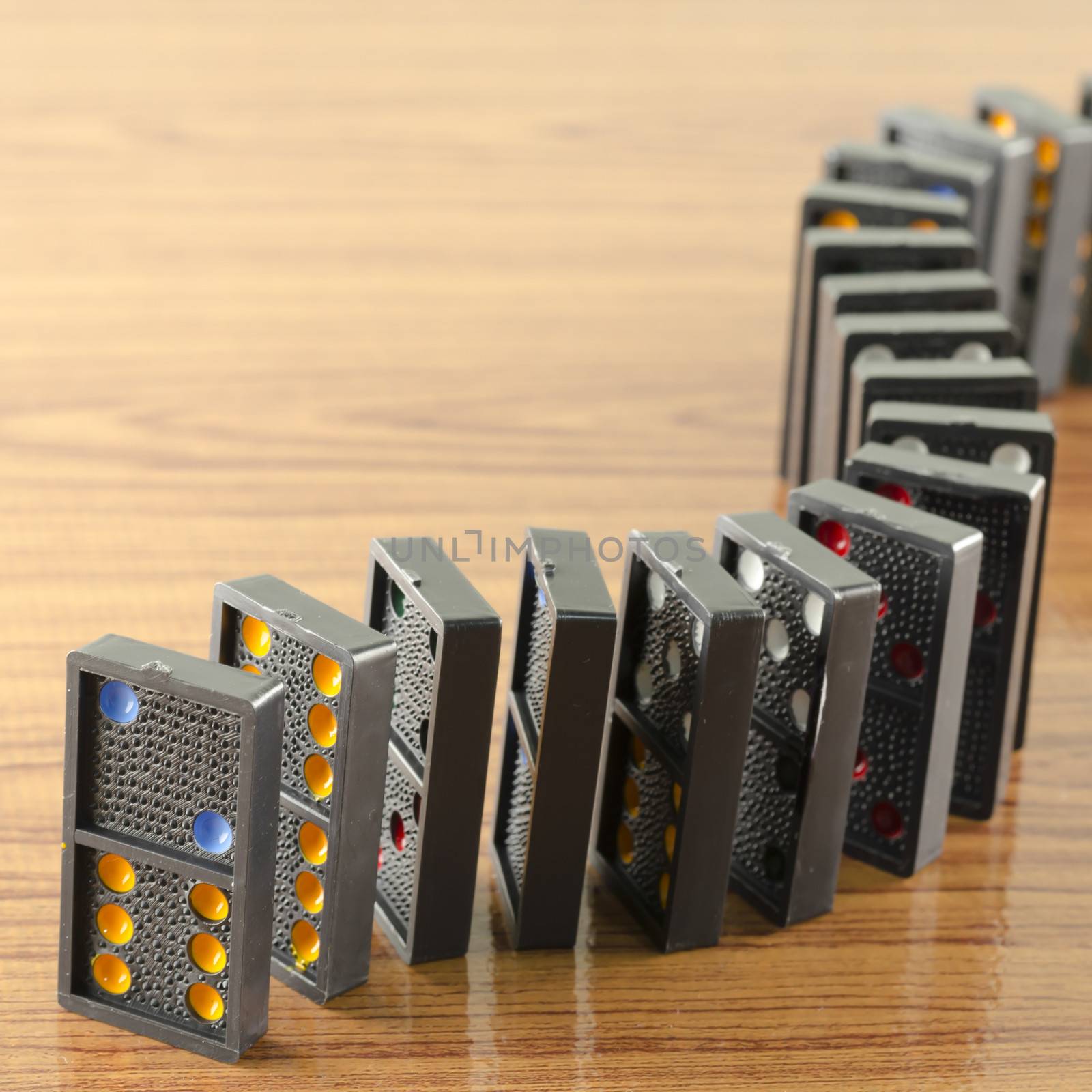 black domino on wooden background