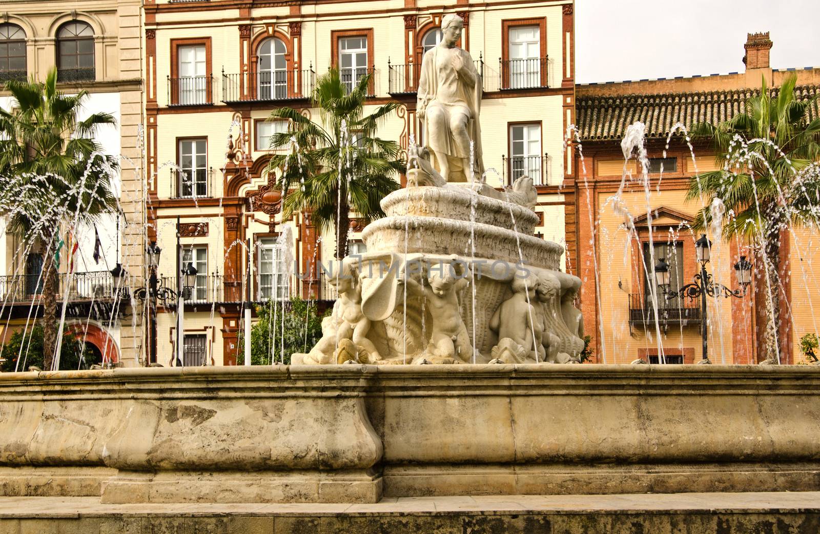 Fountain with sculpture, Seville, Spain. by lauria