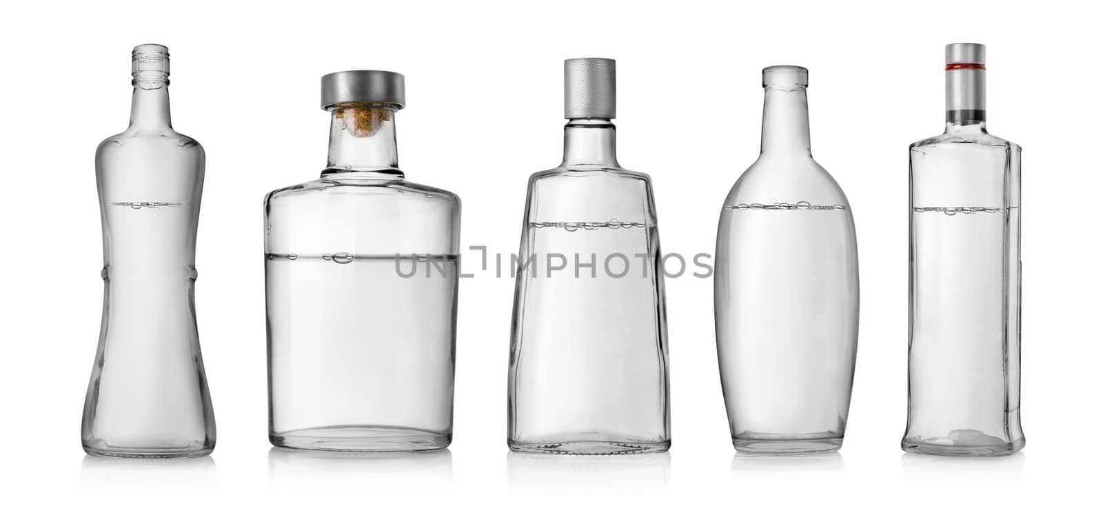 Collage of bottles of vodka isolated on a white background