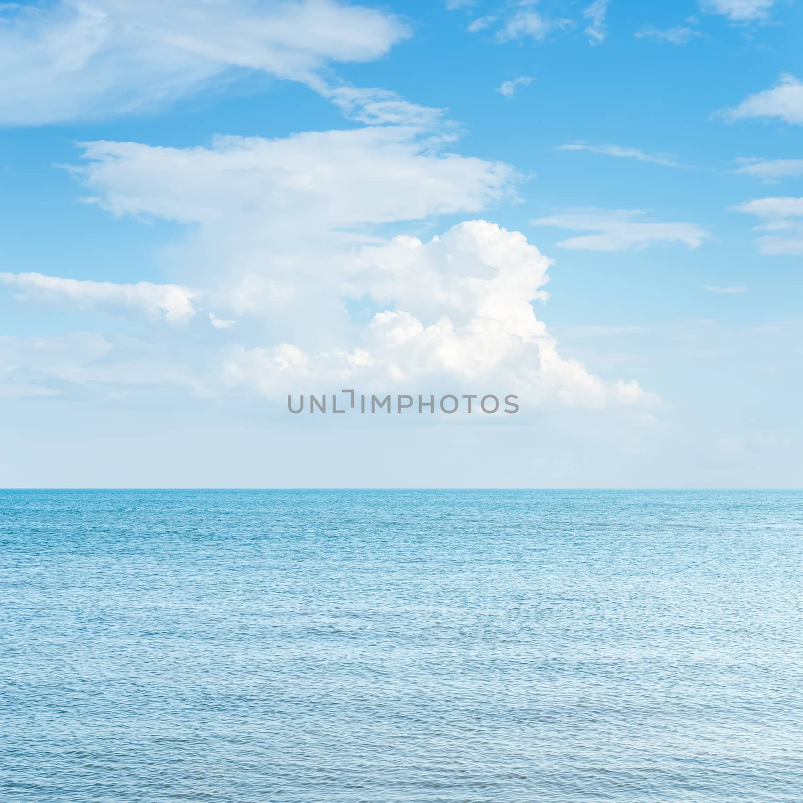 blue sea and cloudy over it