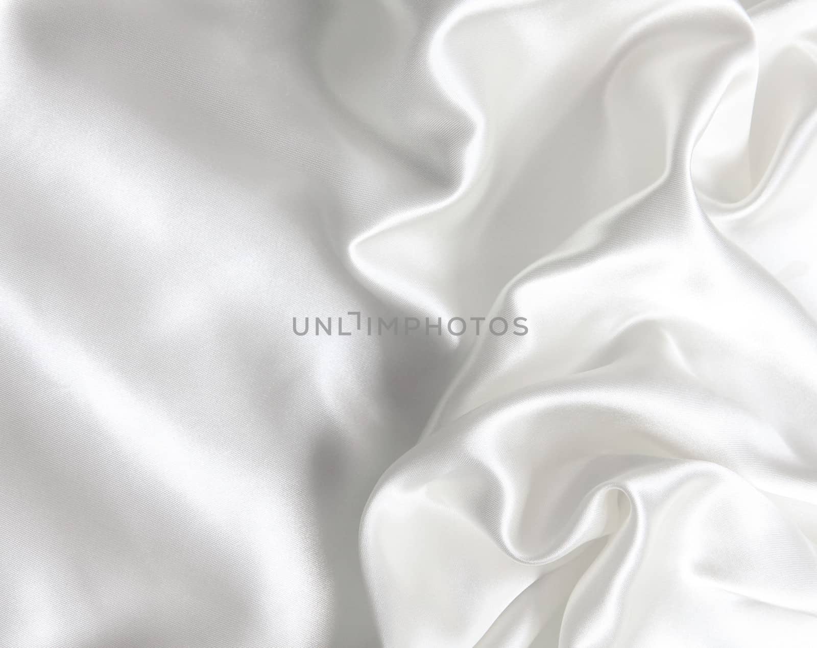Smooth elegant white silk can use as wedding background 