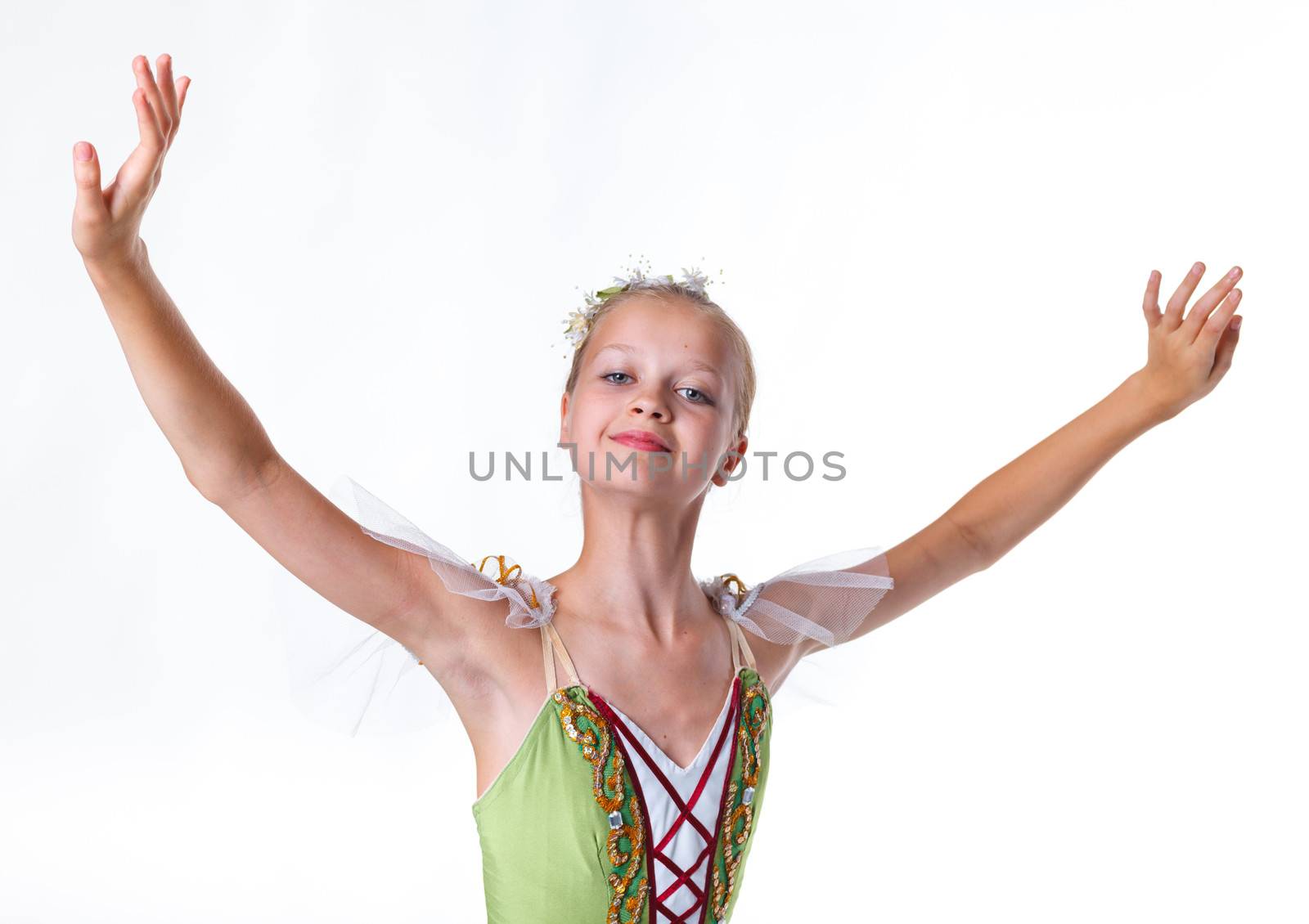 Portrait of beautiful young ballerina on a white background
