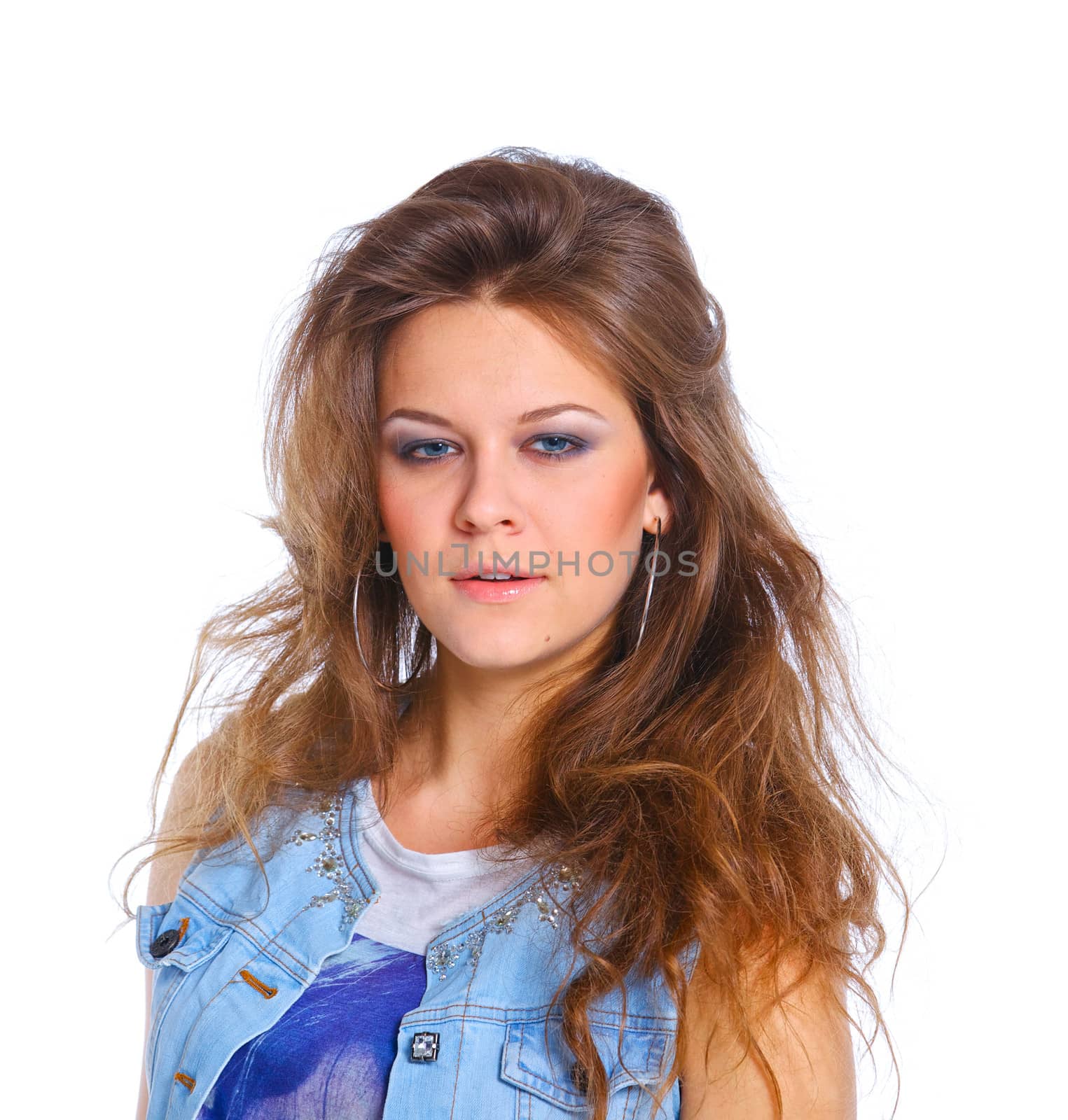Teenagre girl grimacing. Face portrait against white background