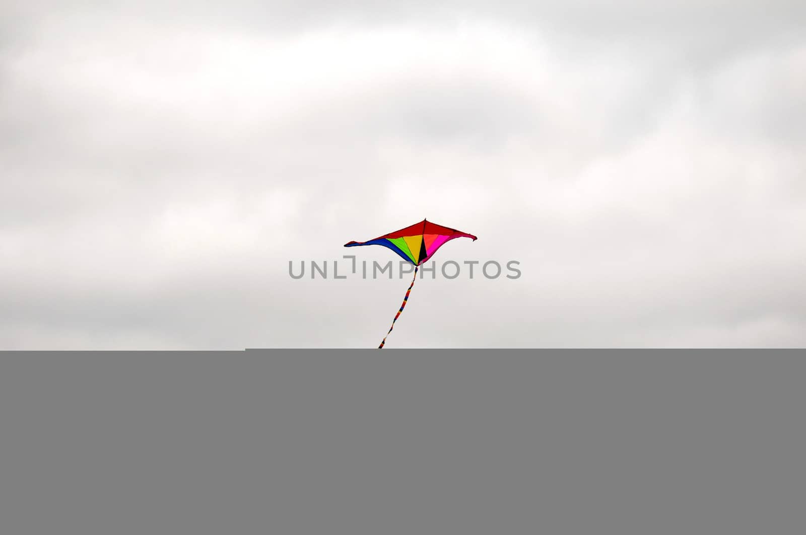One Kite Flying over a Cloudy Sky, in Canary Islands, Spain