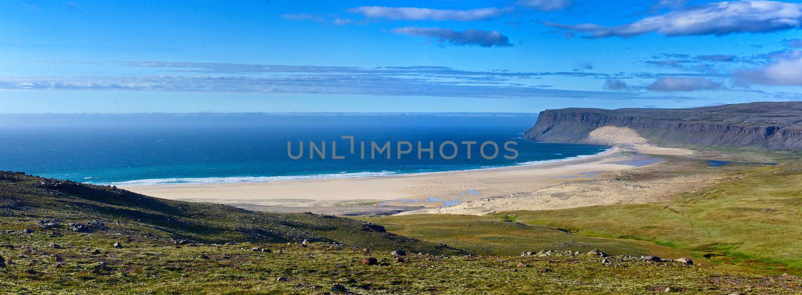 Landscape with white beach at Iceland ocean coast. Panorama.