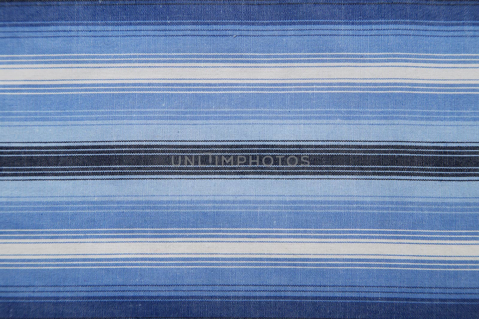 Close-up of a piece of blue and white striped fabric