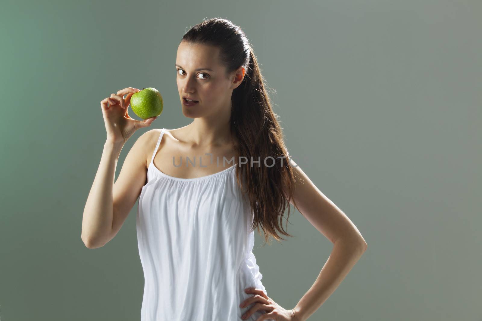 young woman with an apple