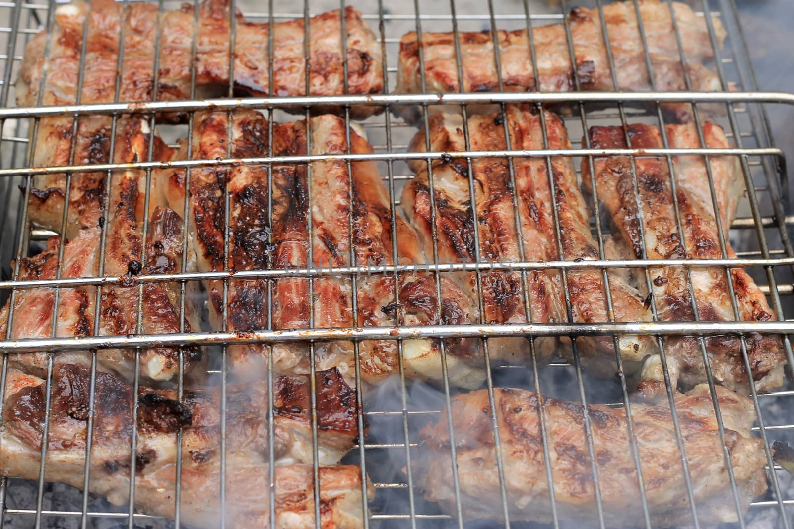 Barbeque fried on the bonfire and coals