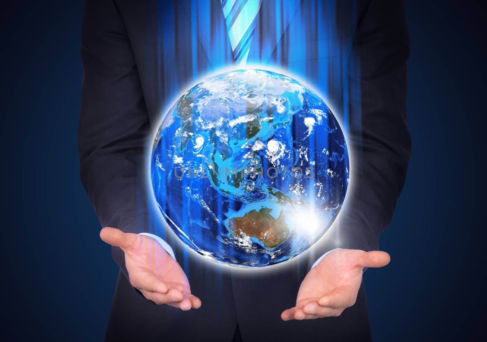 Man in suit holding a earth in hand by cherezoff