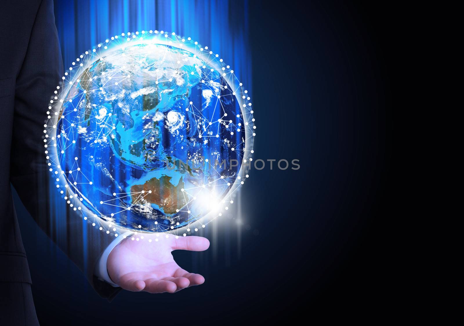 Man in suit holding a earth in hand. Communication around the earth. The concept of communication