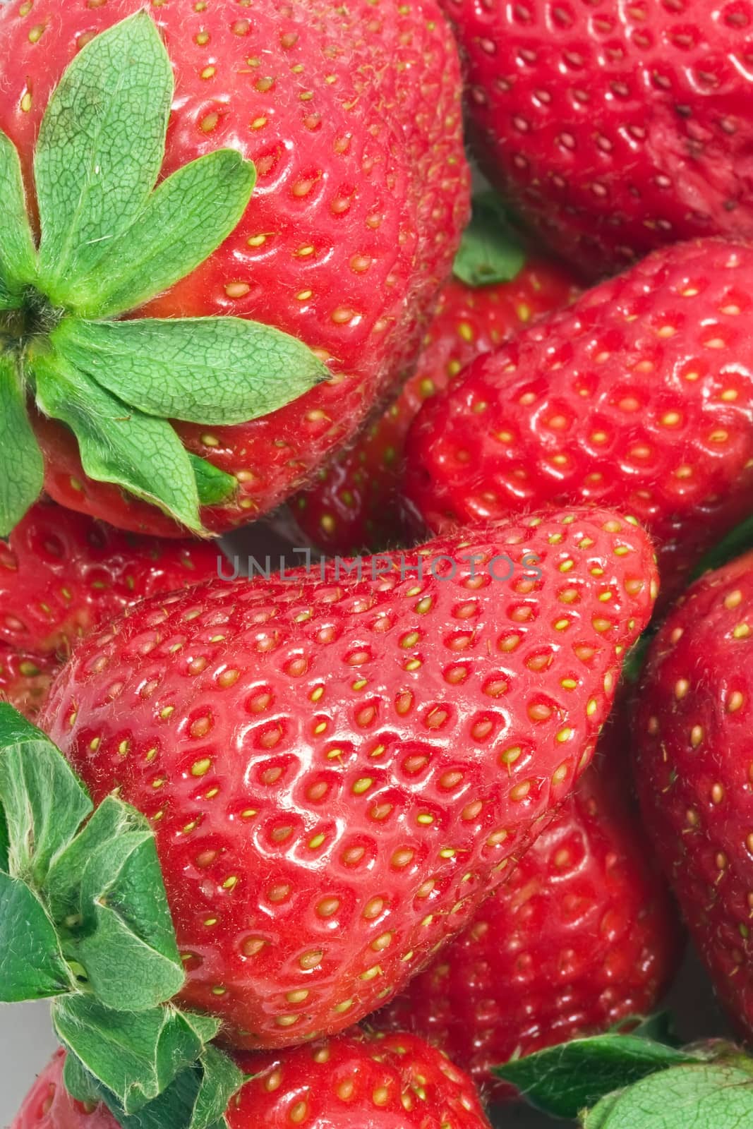 Red sweet strawberries making nice edible background