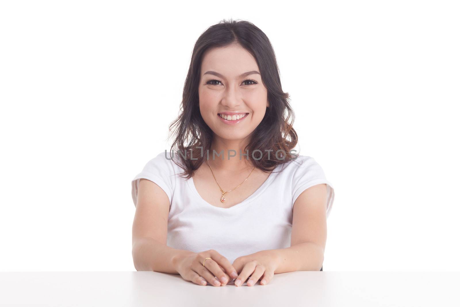 Asian woman isolated on white background. white t-shirt, sit on chair with table