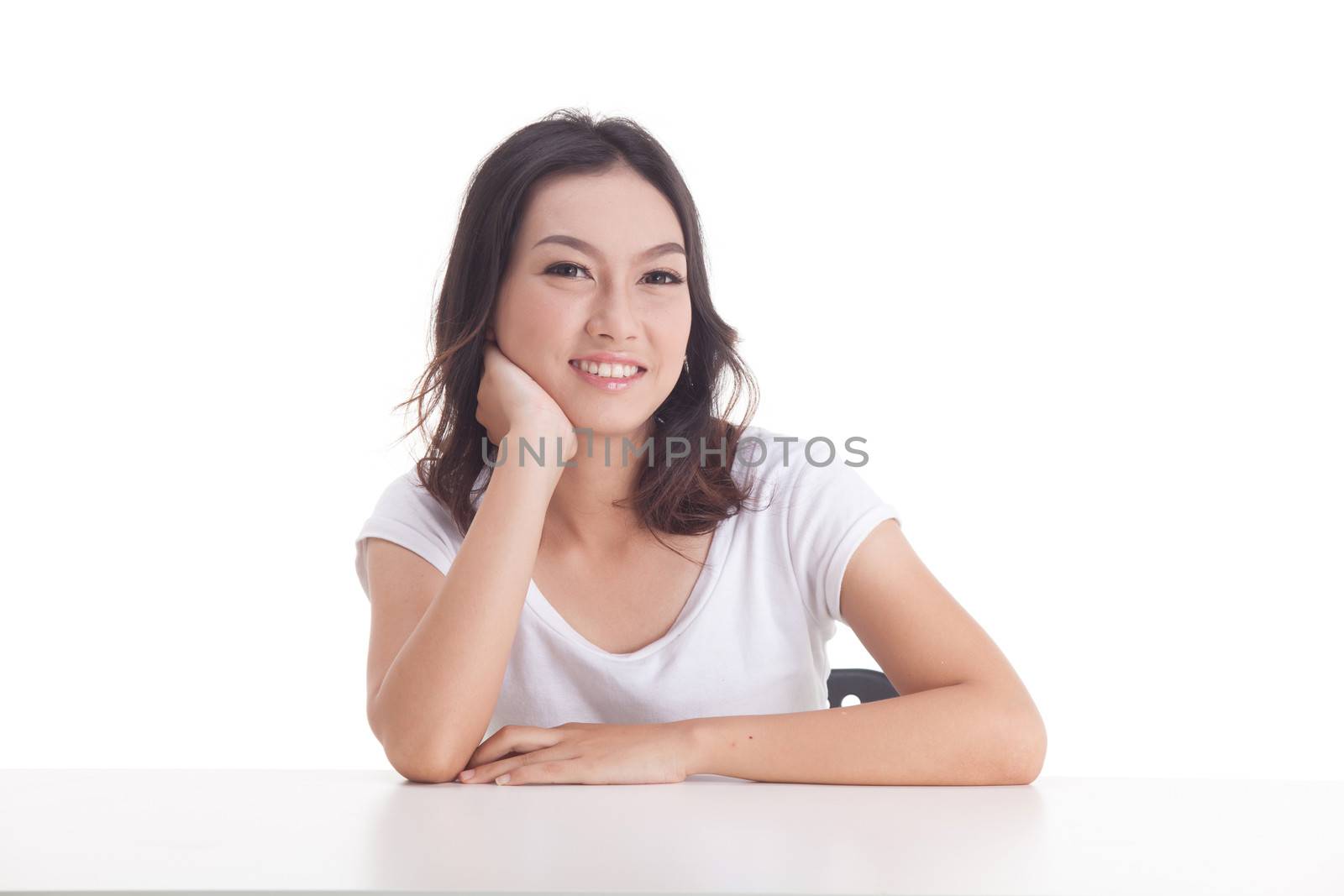 Asian woman isolated on white background. white t-shirt, sit on chair with table