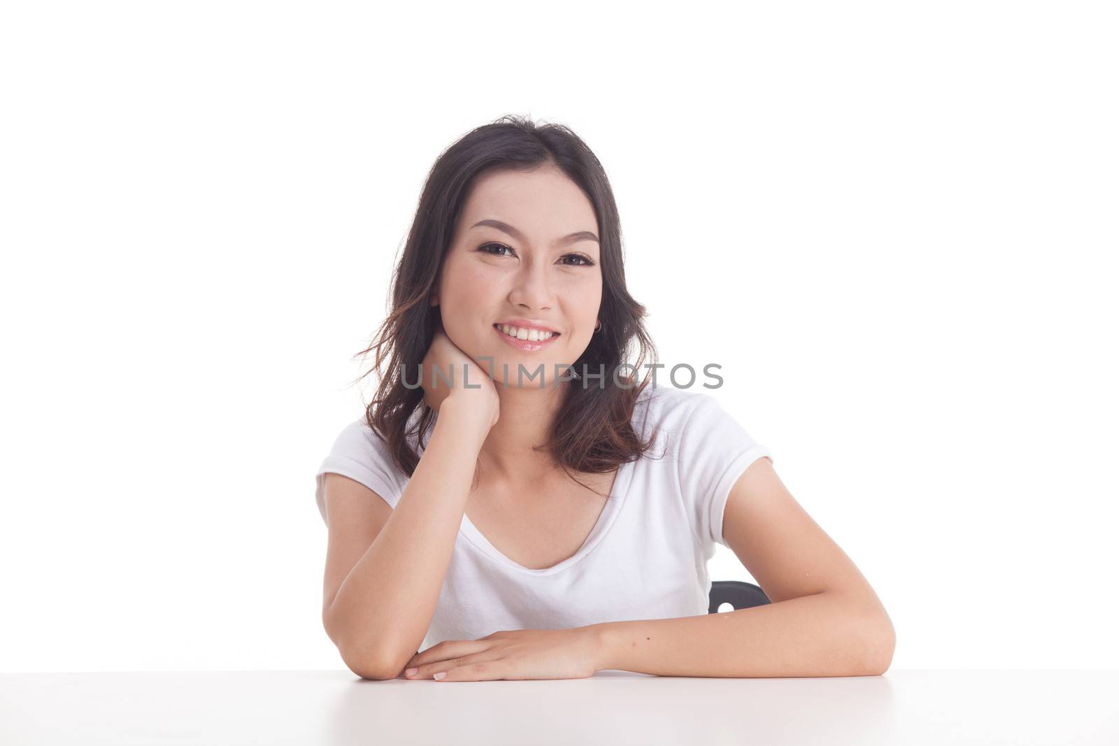 Asian woman isolated on white background. white t-shirt, sit on chair with table