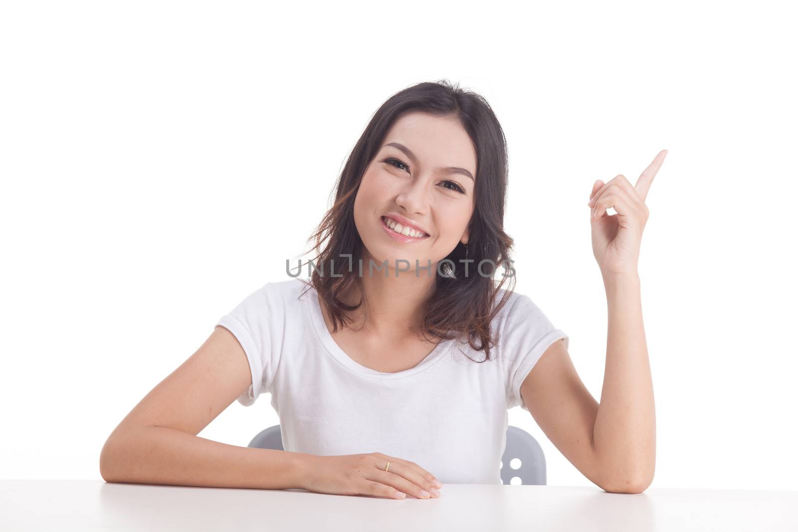 Asian woman isolated on white background. white t-shirt, sit on chair with table