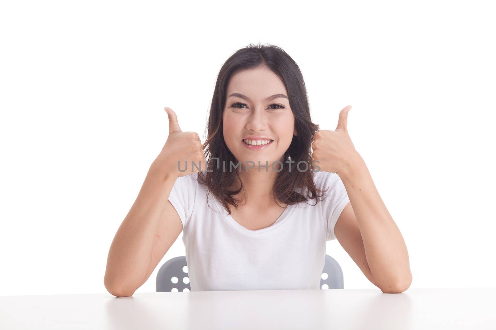 Asian woman isolated on white background. white t-shirt, sit on chair with table