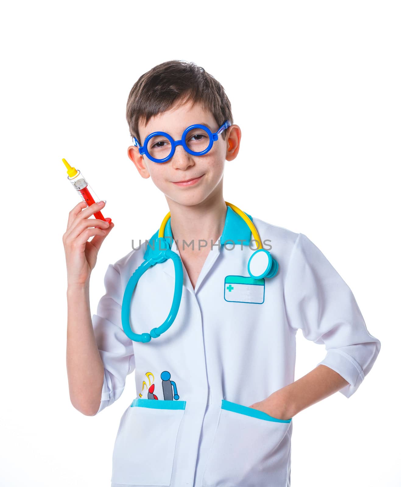 Portrait of a little smiling doctor with stethoscope and syringe. Isolated on white background