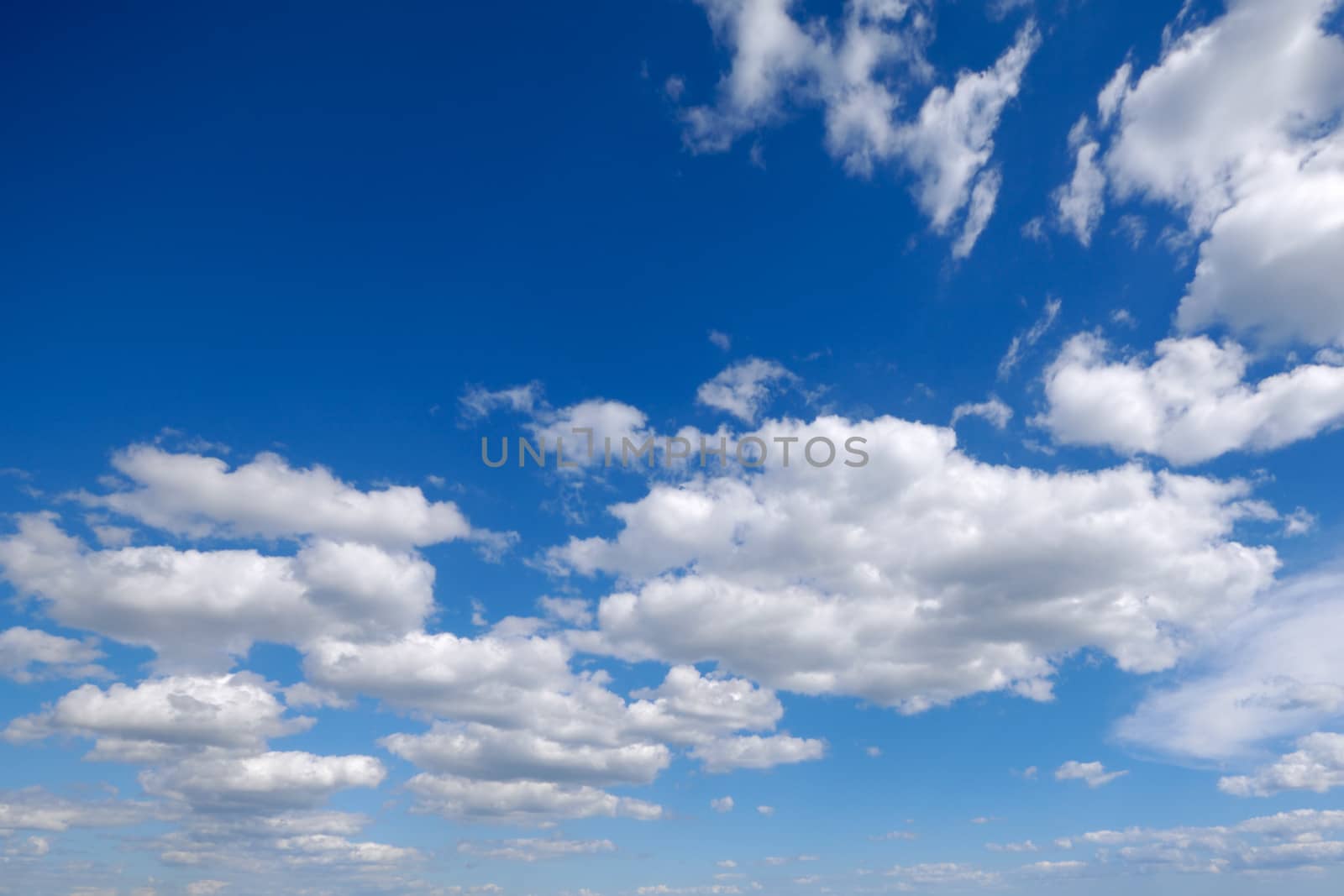 Blue sky and cloudscape with cumulus clouds