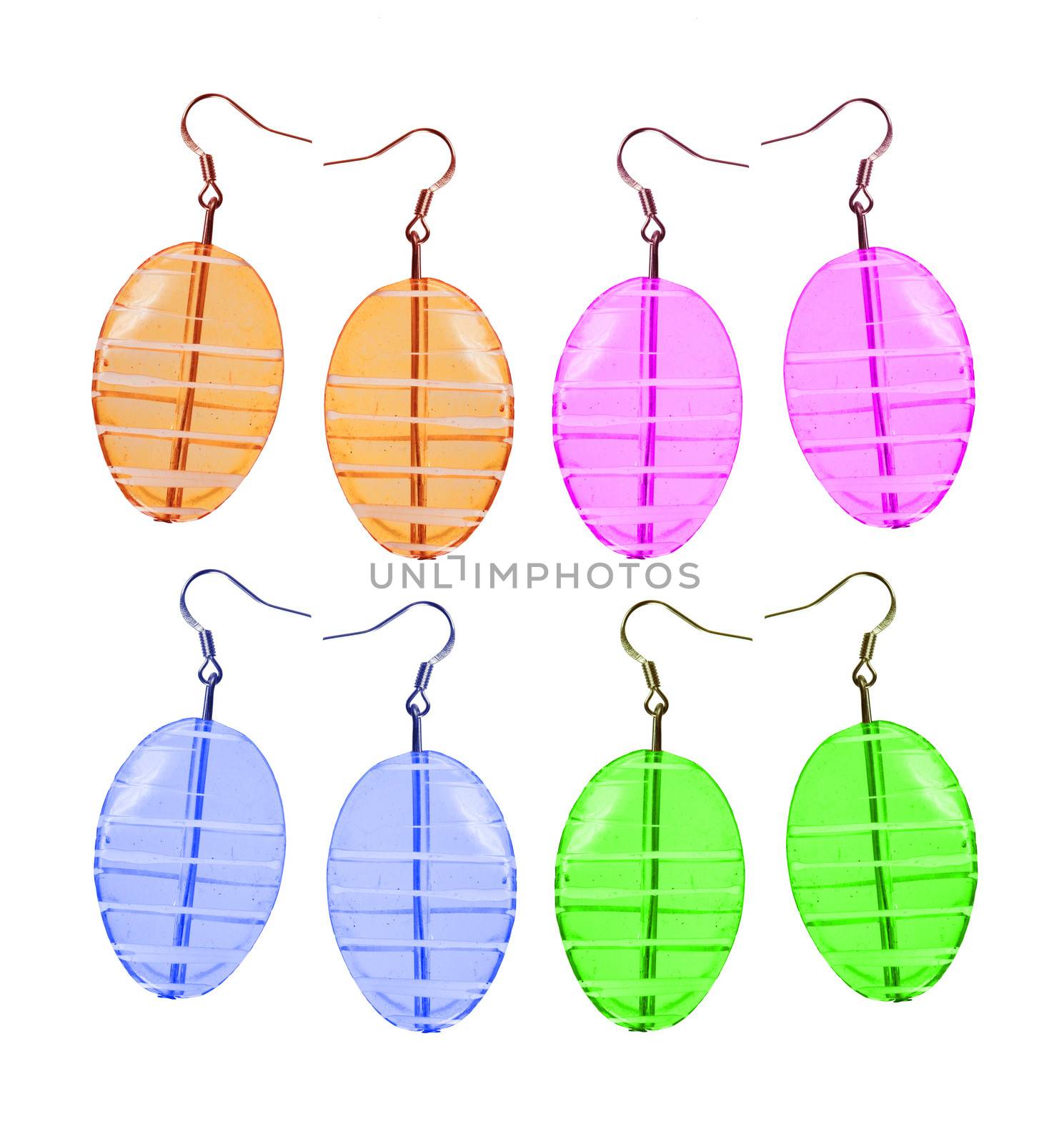 Earrings made and glass isolated on white background in different colors. Four pairs. Collage.

