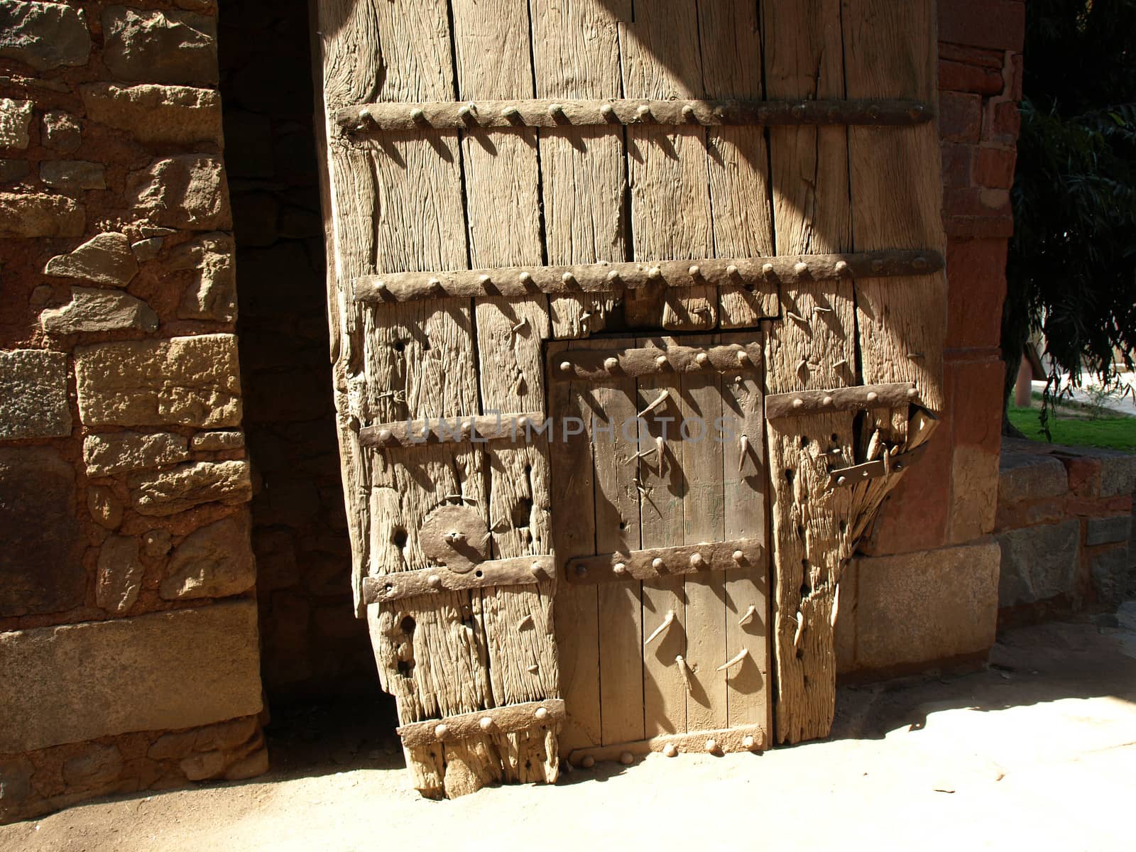old wooden door on the Hamayun tomb in New Delhi     