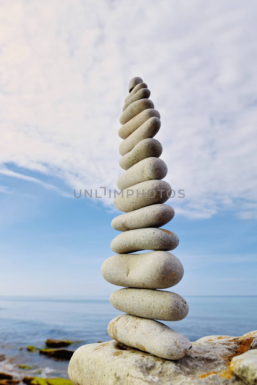 Pyramidal stack of pebbles on the seacoast