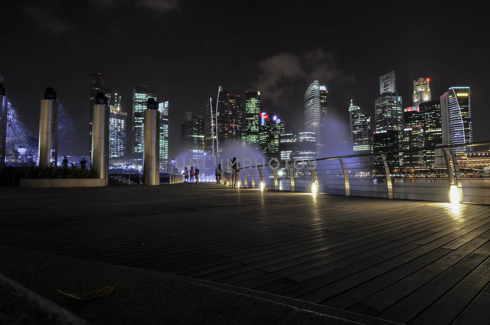 Singapore city skyline finacial district at night by weltreisendertj