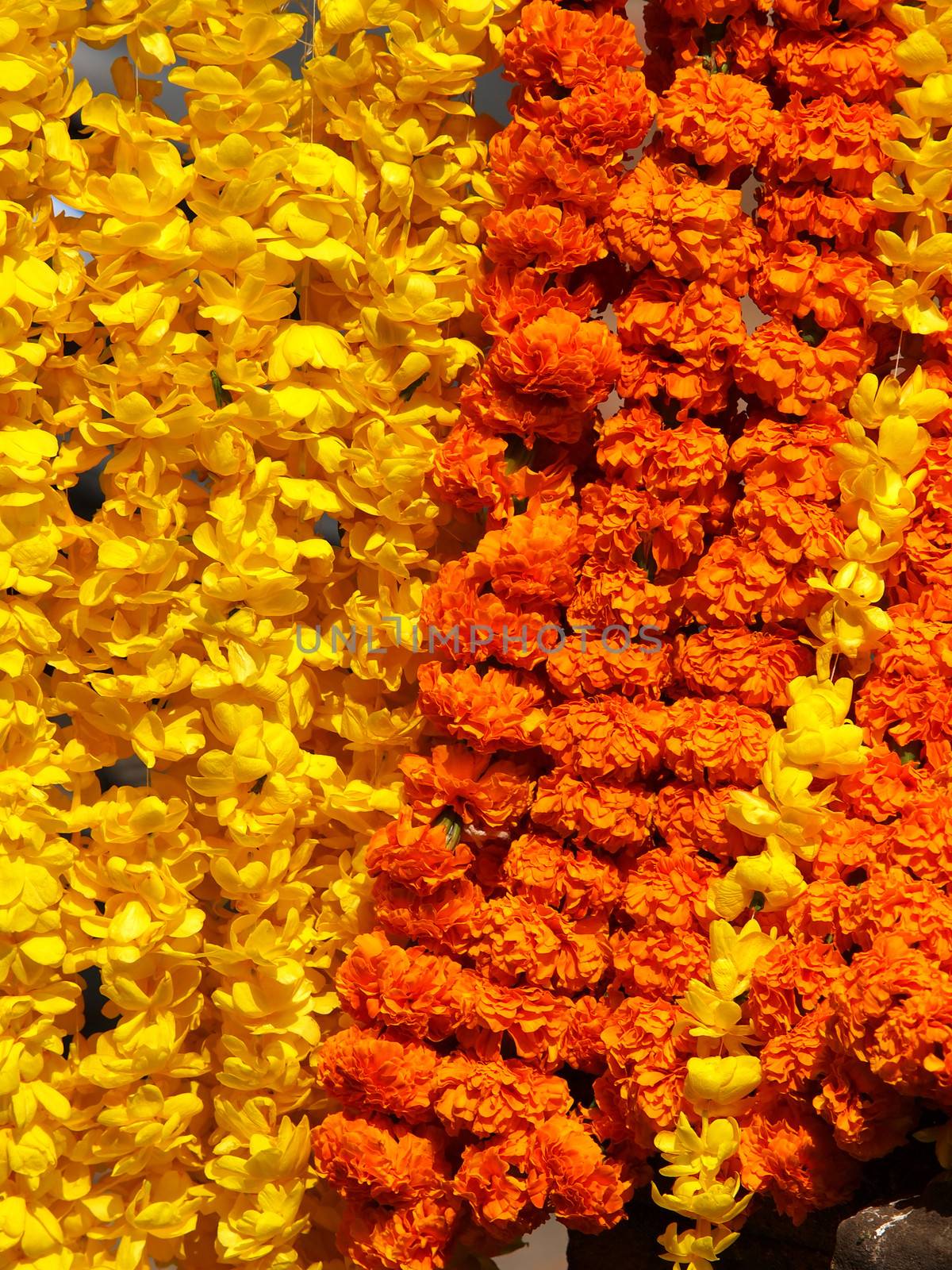 floral arrangement for holi festival and religious offerings in india.        