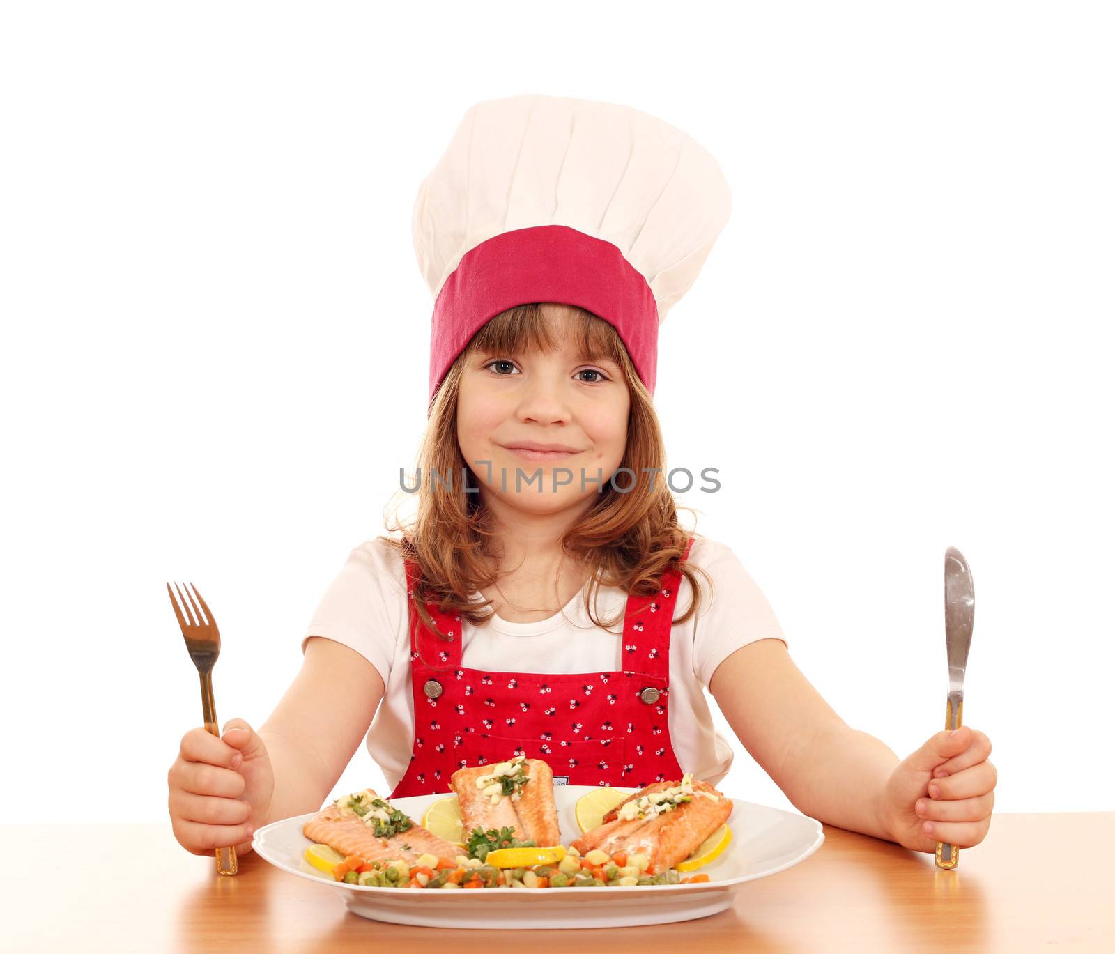 little girl cook with fork and knife