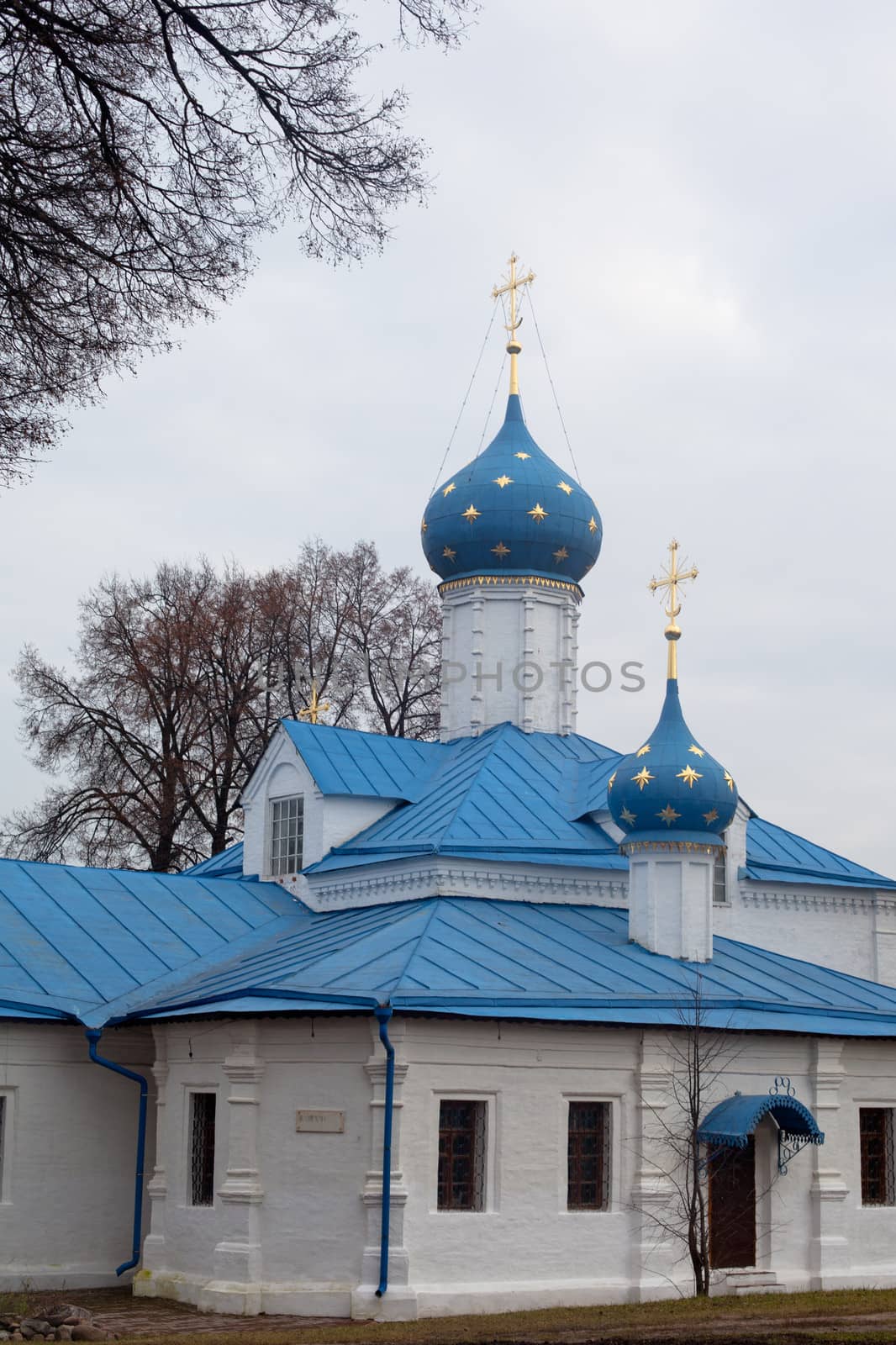 White orthodox church with blue domes
