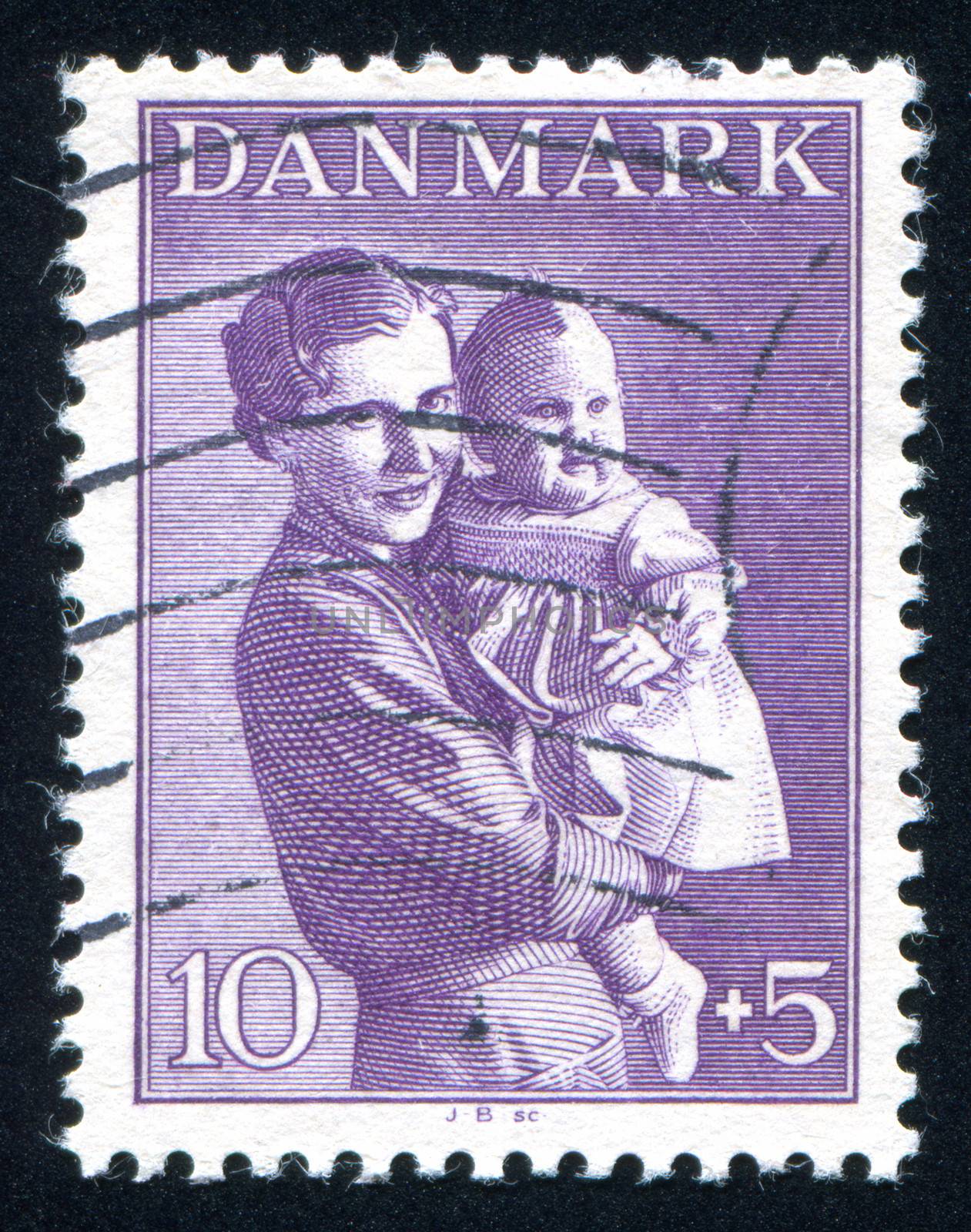DENMARK - CIRCA 1941: stamp printed by Denmark, shows Woman and child, circa 1941