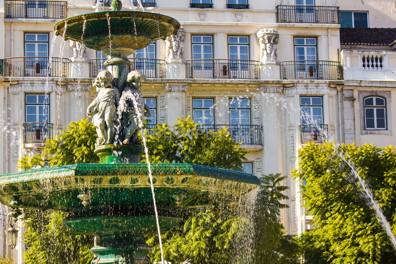 fountain at Rossio square in Lisbon, Portugal by 1shostak