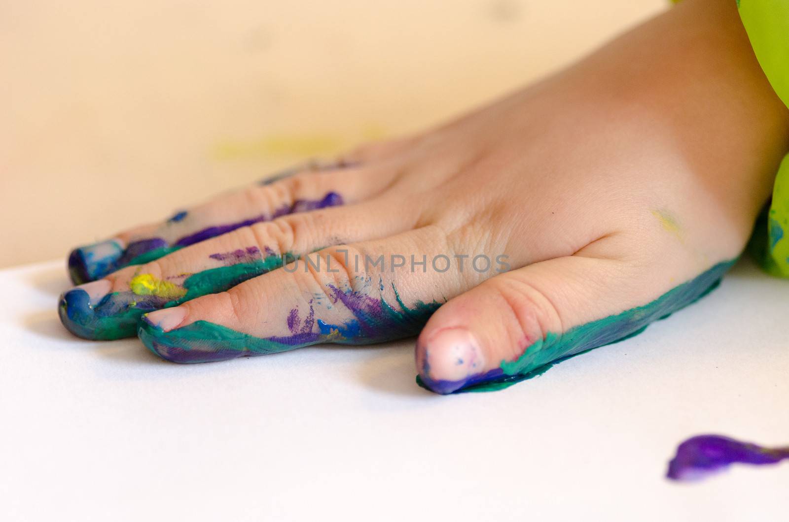 Child painting with hands by Arrxxx