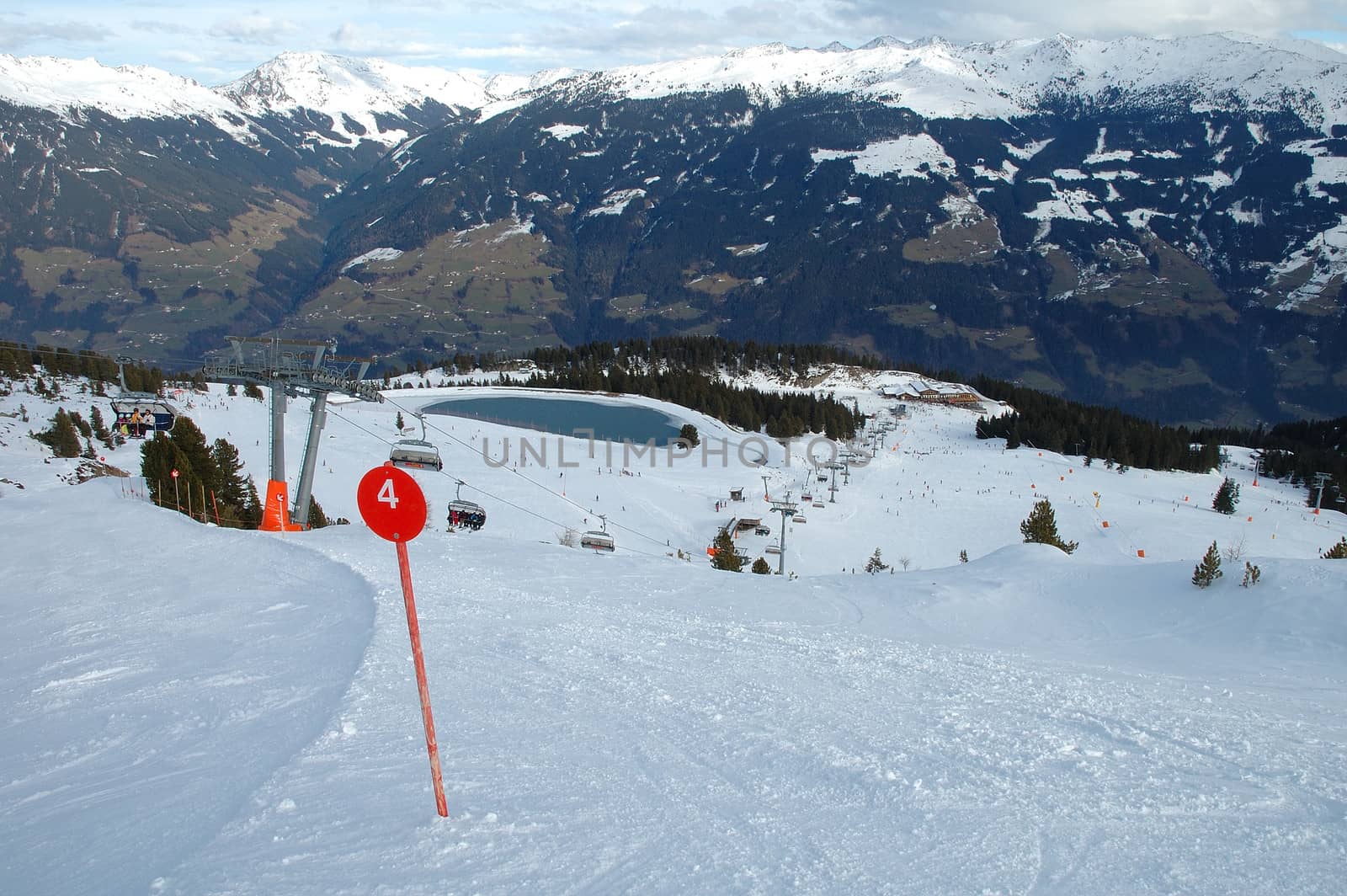 Slope and slope number sign in Alps nearby Kaltenbach in Zillertal valley in Austria